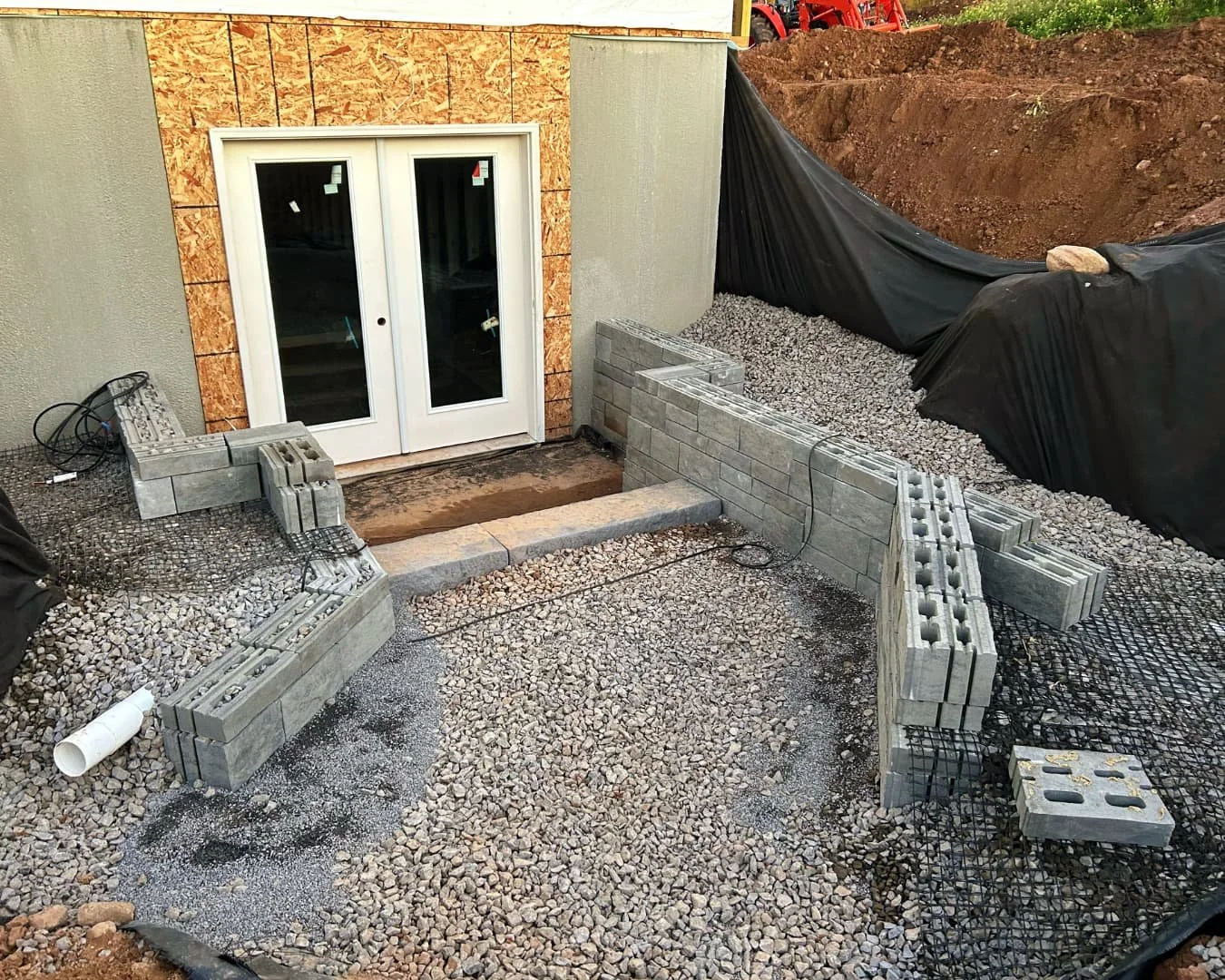 Rear entry hardscape base preparation by Pines and Pavers in Cazenovia, New York.