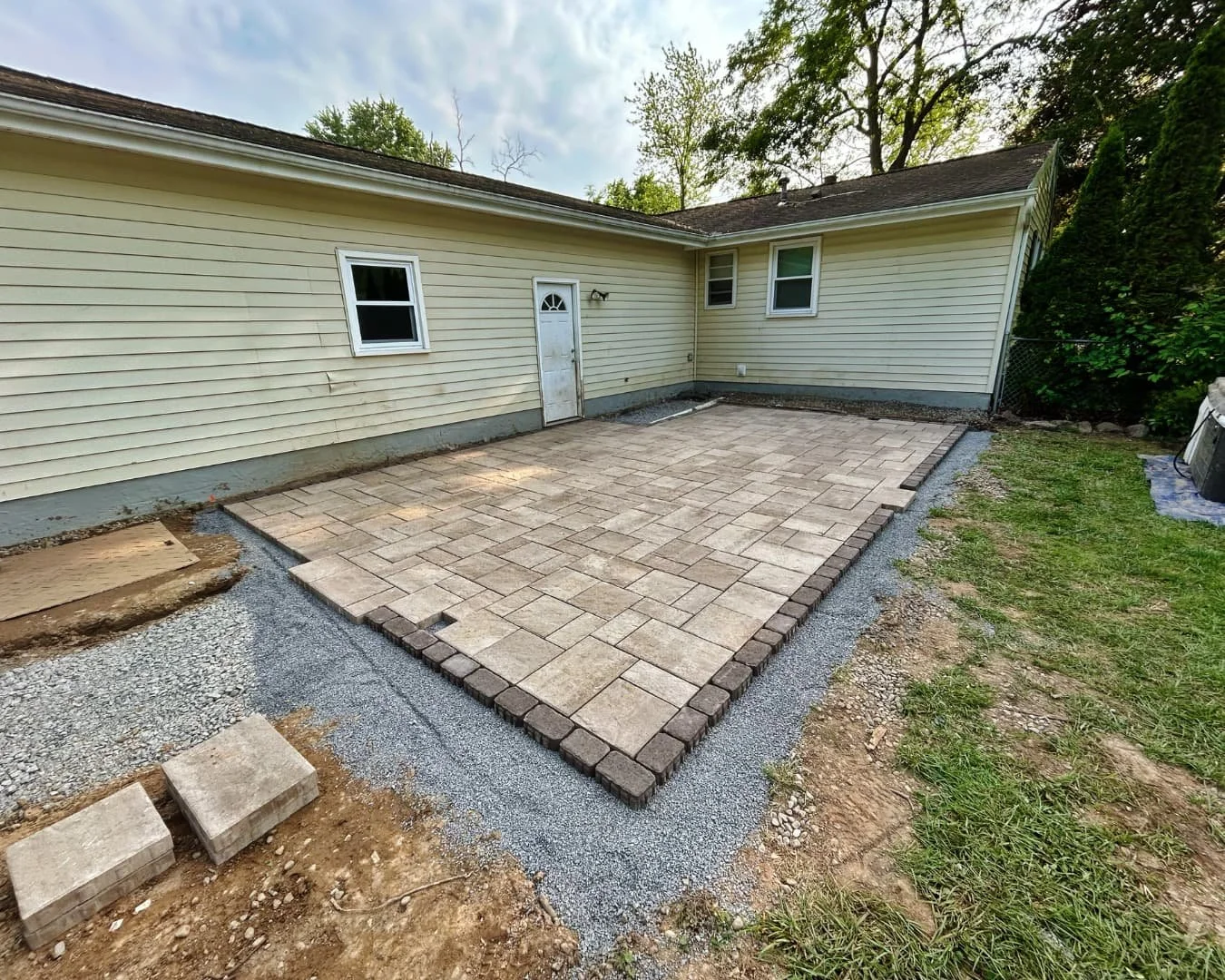 Patio base and framing during installation by Pines and Pavers in Central New York.