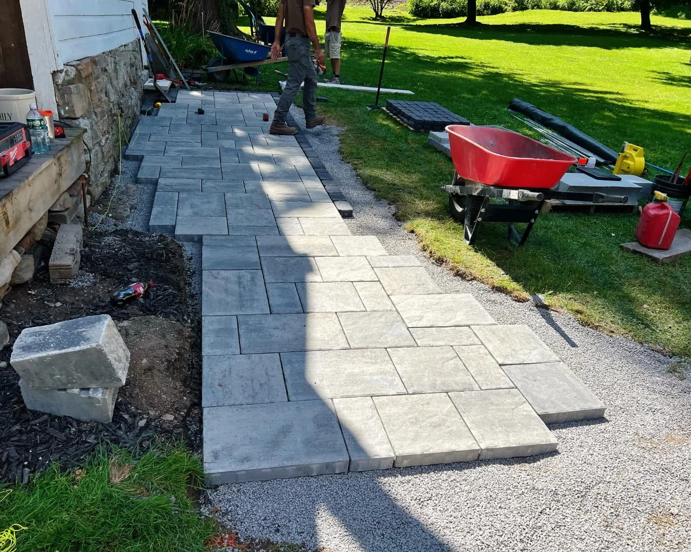 Walkway installation in progress by Pines and Pavers in Cicero, New York.