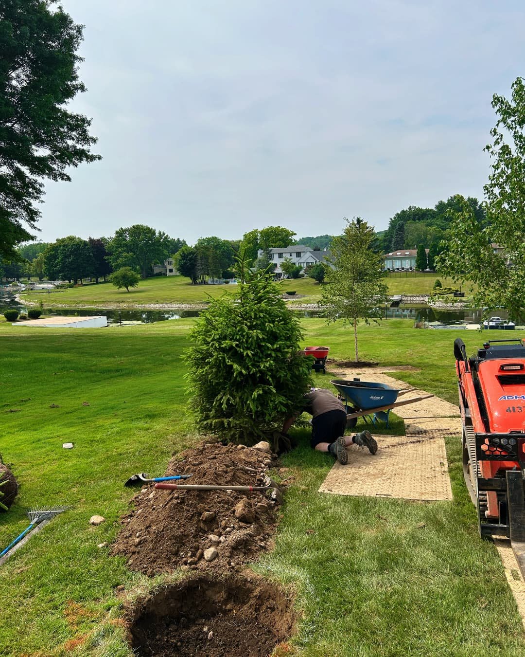 New planting bed installation in progress by Pines and Pavers in Skaneateles, New York.