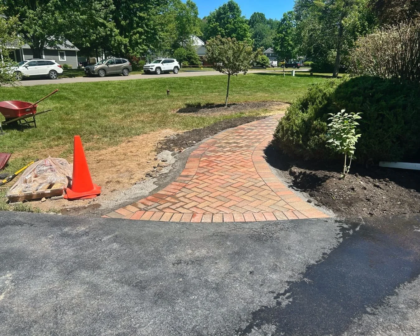Front entry area during base preparation by Pines and Pavers in Manlius, New York.