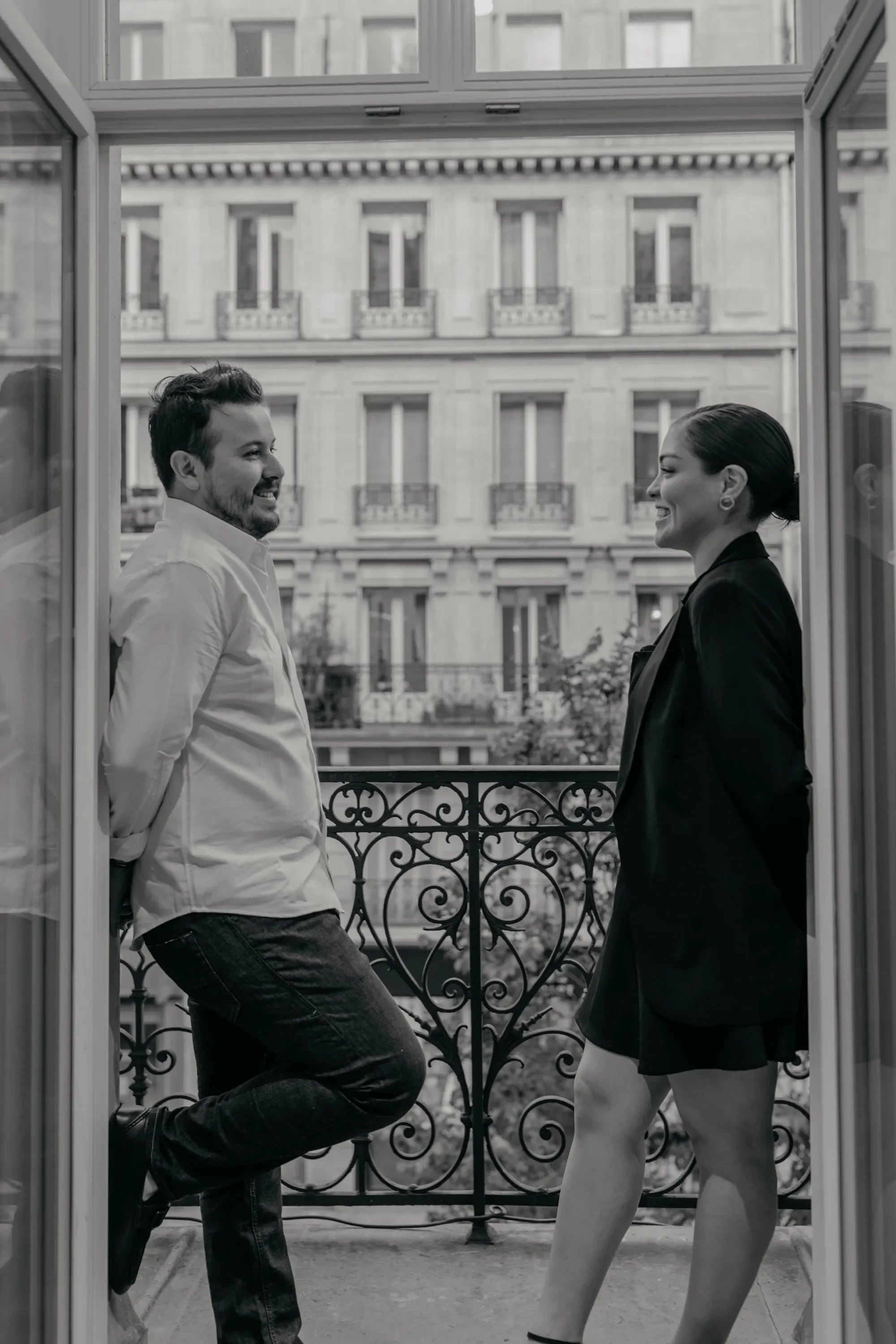 Couple Window Paris.webp