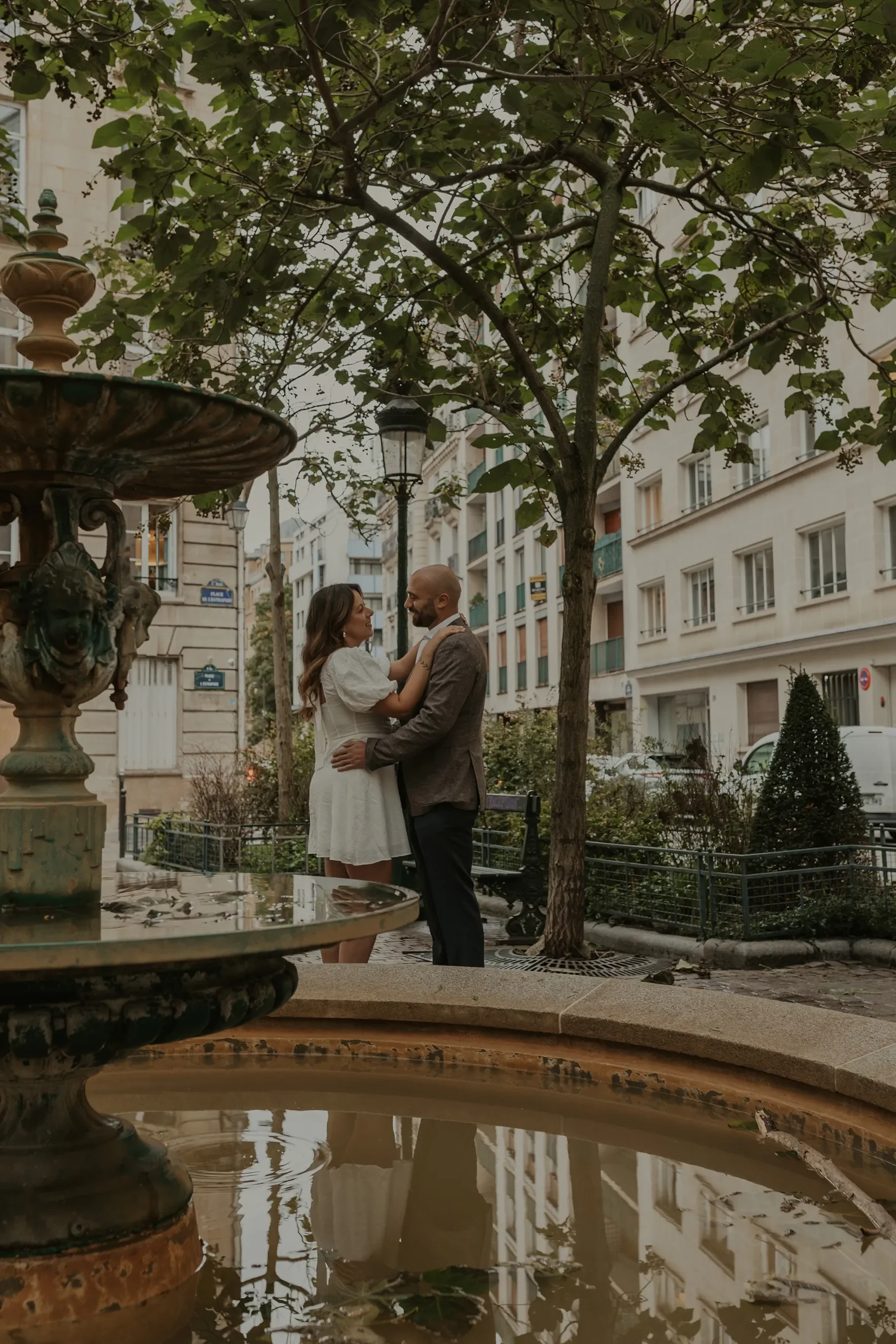 Couple Paris Buildings.webp