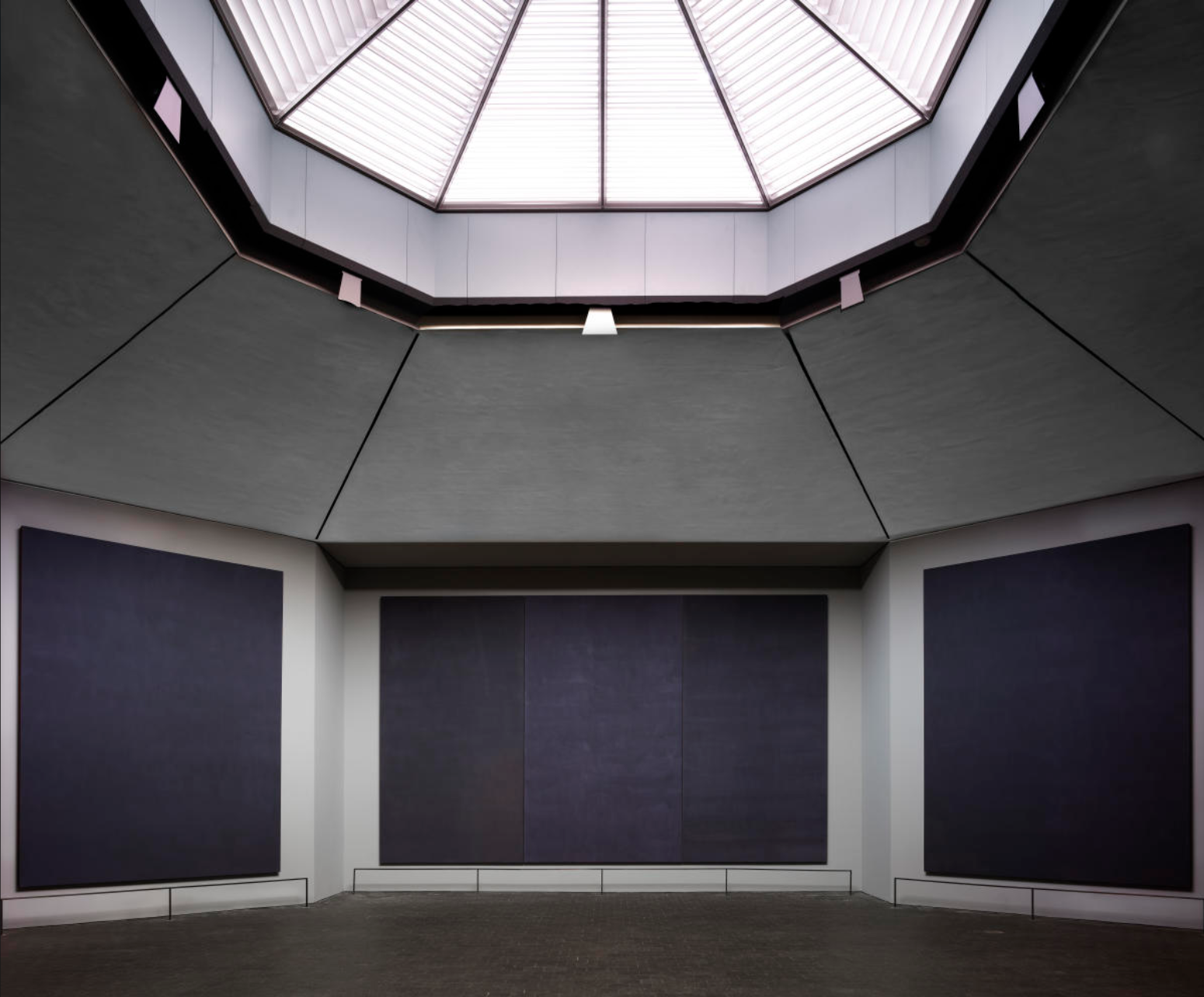 interior view of the Rothko Chapel's dark atmospheric panels, serving as the digital gateway to art gallery contemporary art atelier artquia . private vault and blue chip art work collection.