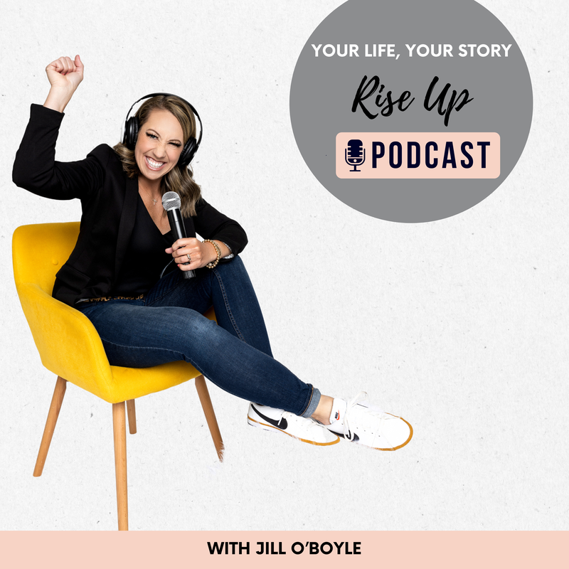 A woman sitting on a yellow chair, smiling, wearing headphones and holding a microphone, with her right arm raised in a fist. The background has a circular gray graphic containing the text "Your Life, Your Story, Rise Up, Podcast" with a microphone icon. The bottom of the image has a pink banner with the text "With Jill O'Boyle."