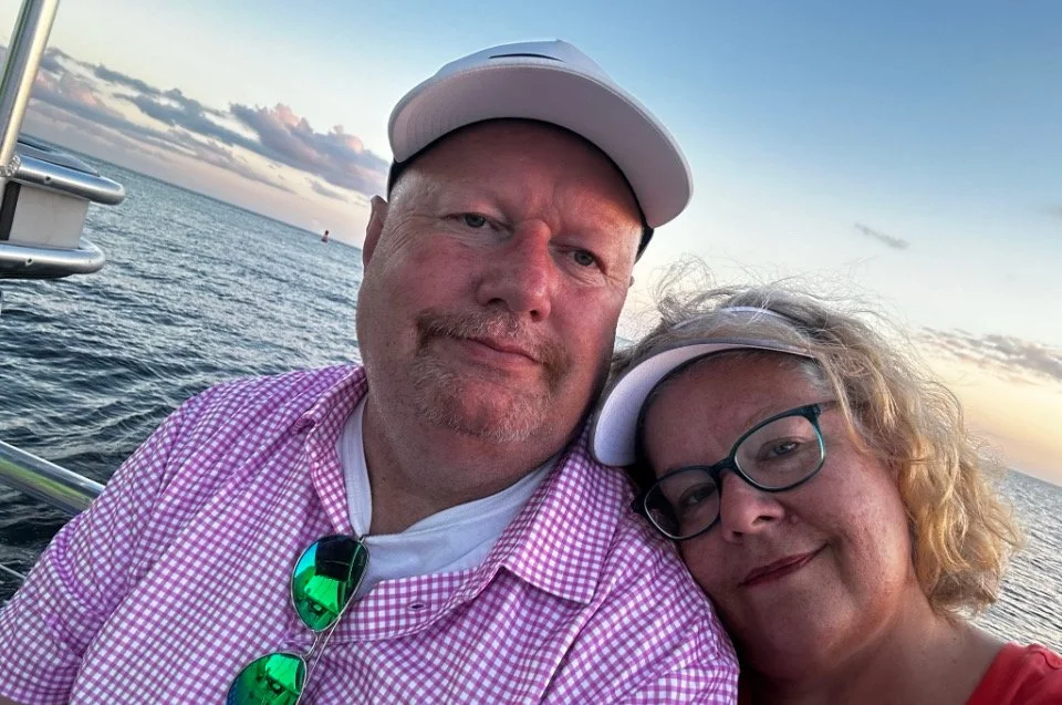 Chris and Cindi enjoying time on the waves nearing sunset