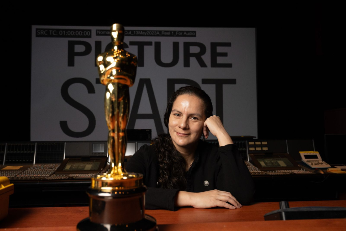 Michelle Couttolenc with Academy Award for Sound of Metal
