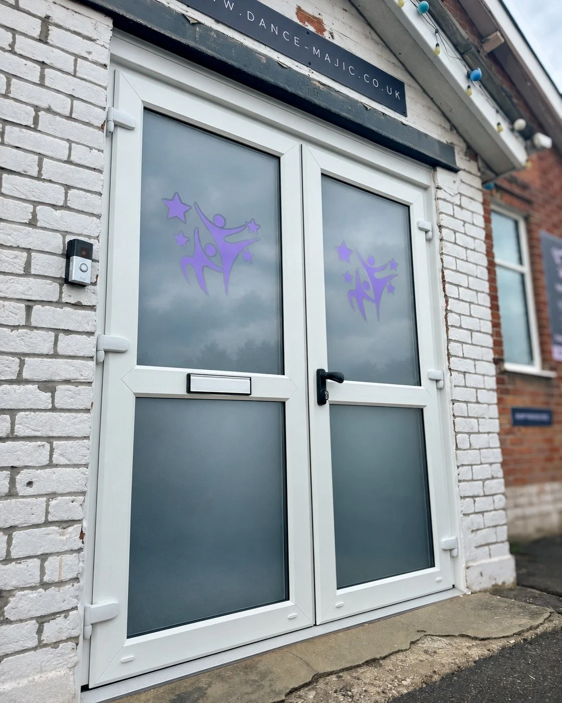 Privacy without losing the branding.

@dancemajicdorset recently had new doors installed and wanted to add some privacy while still making the entrance feel like part of the business.

Frosted vinyl with their branding was added, finished with a slim