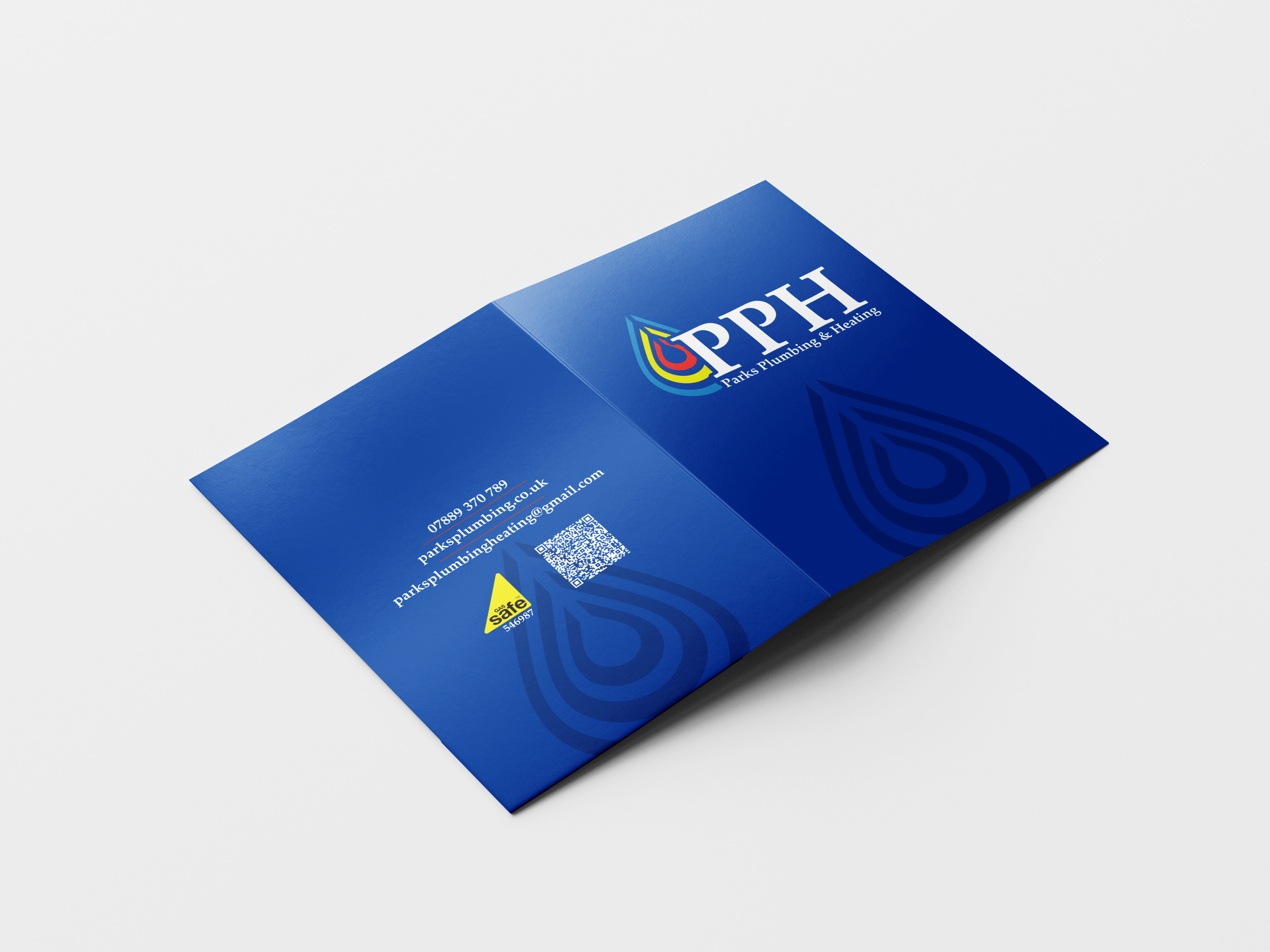 A blue brochure for Parks Plumbing & Heating with a multicolored drop logo, contact information, and a QR code.