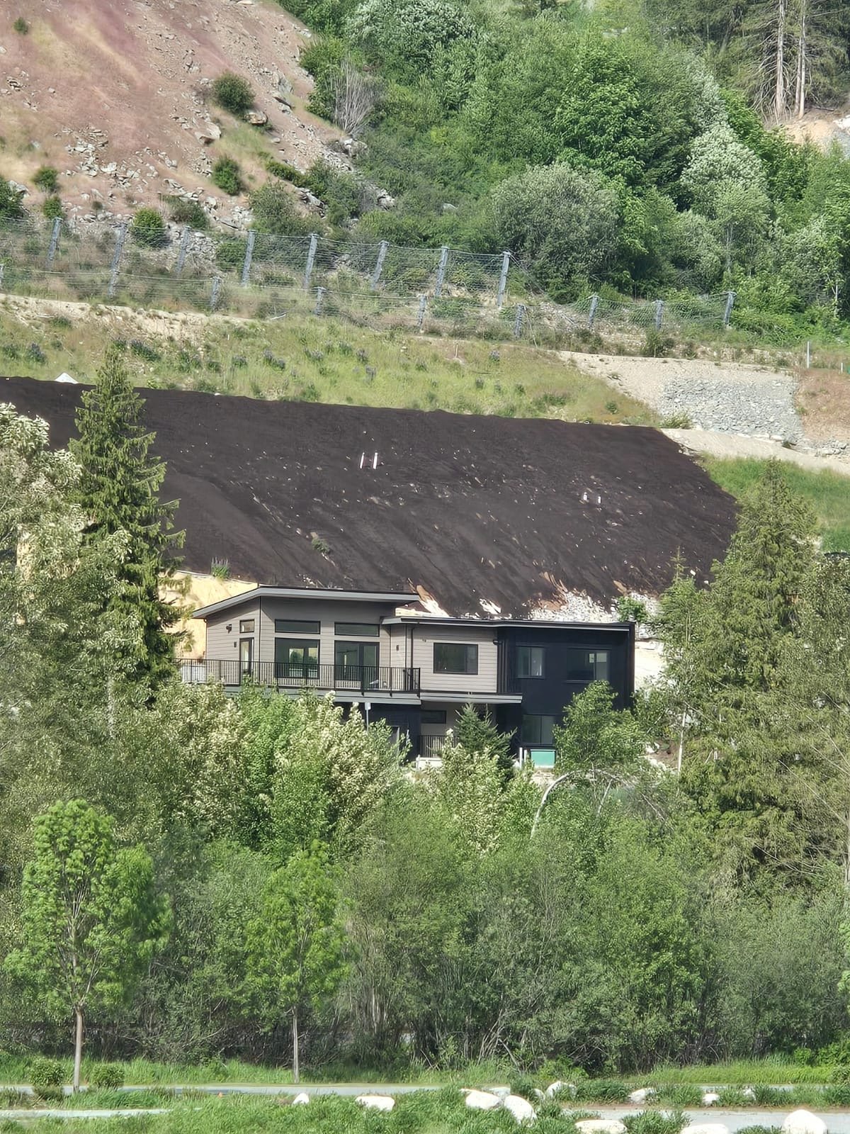 Completed project placing material on steep access site in Squamish
