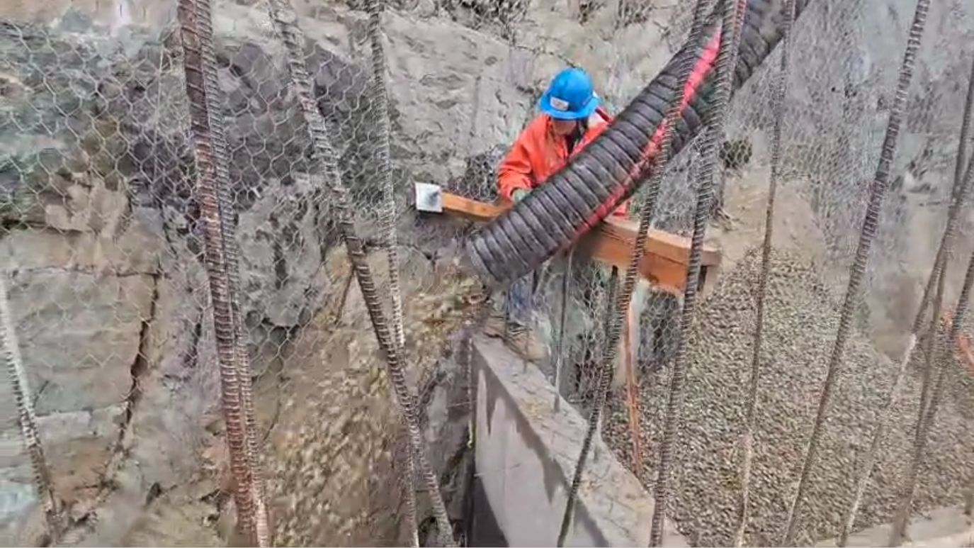 Closeup of backfill gravel delivery to large commercial project. 