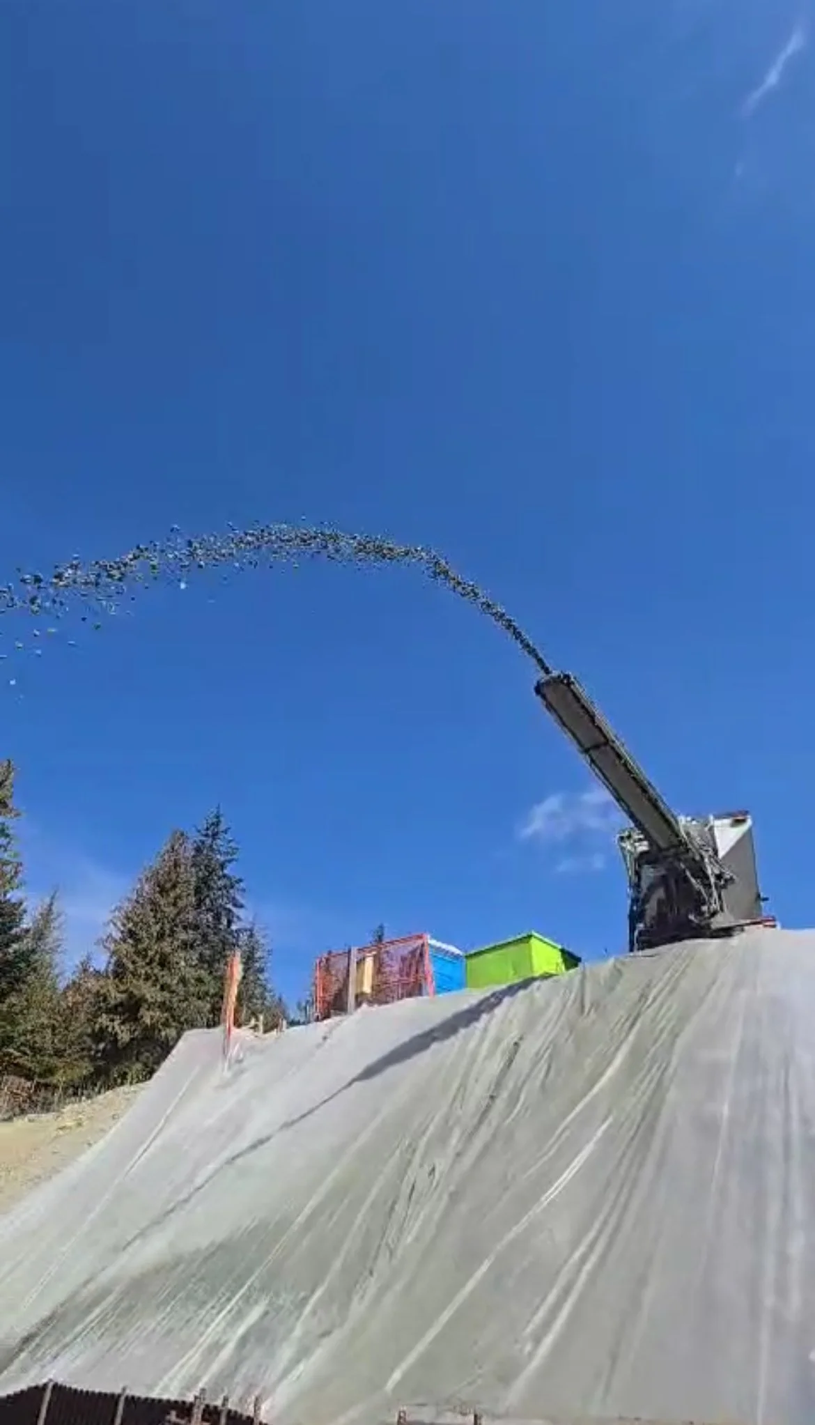 Aggregate being placed accurately on construction project Sea to Sky