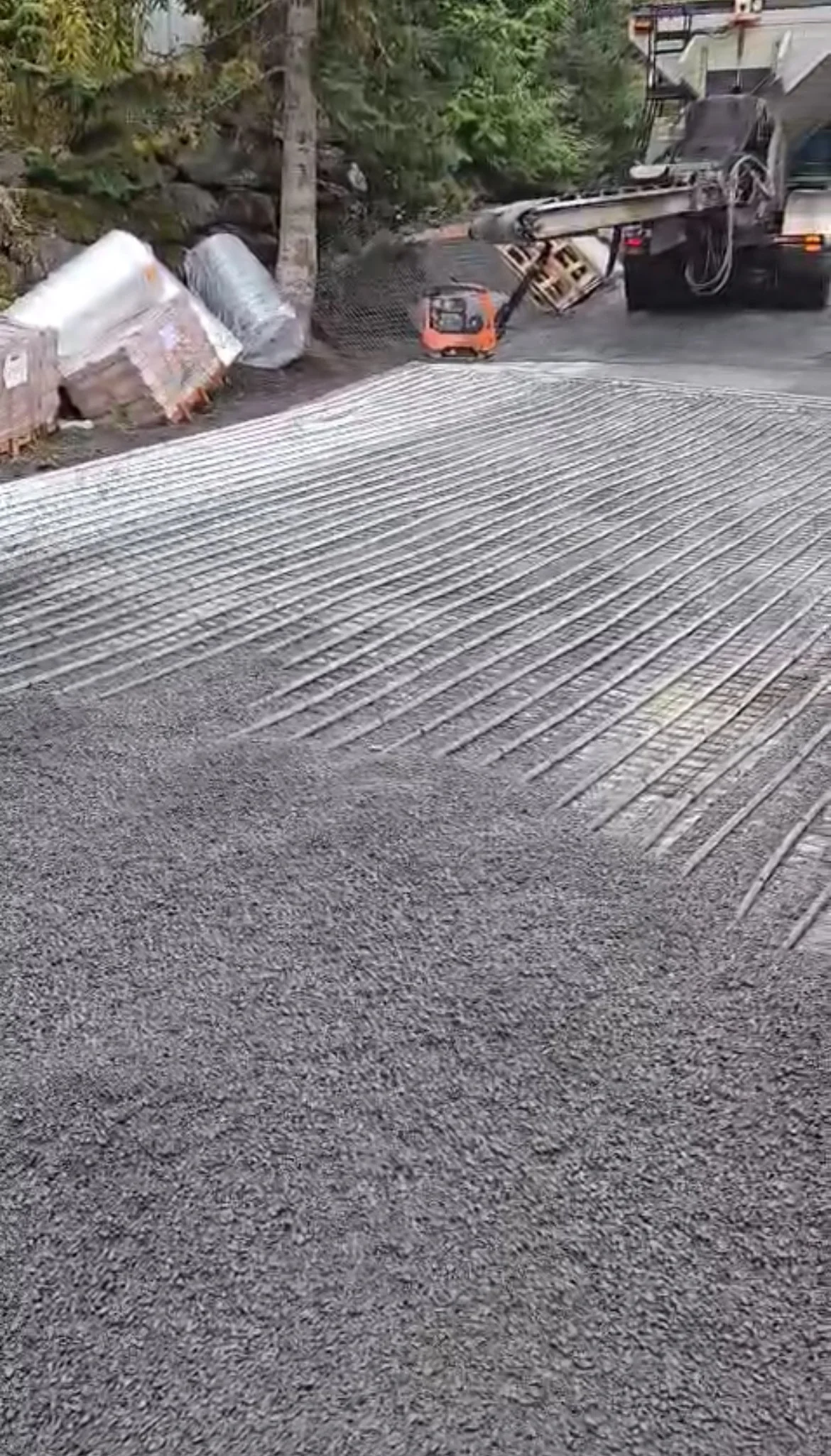 Equipment working on road base project.