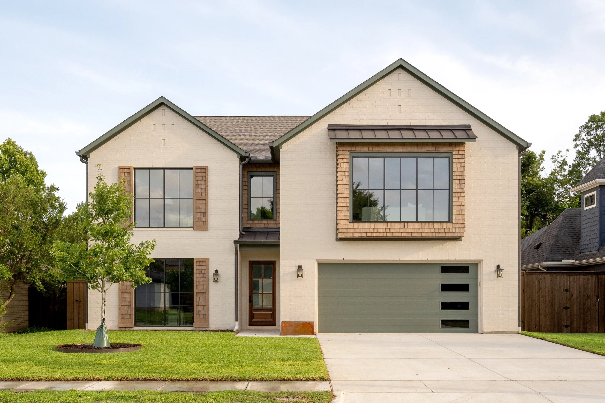 9217 Livenshire Drive, Dallas - front elevation at afternoon light