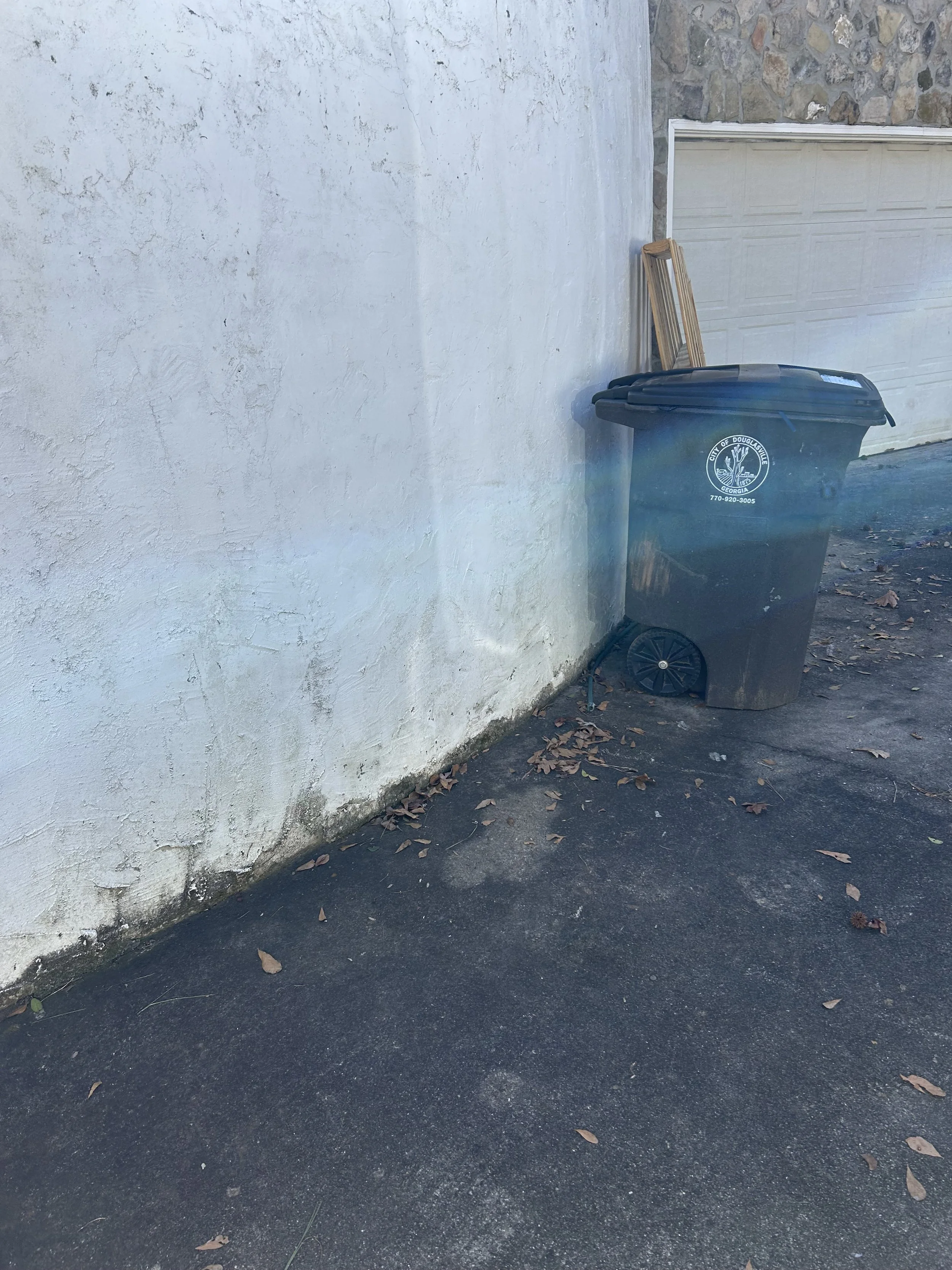 Before and after junk removal in Douglasville GA showing full property cleanout transformation