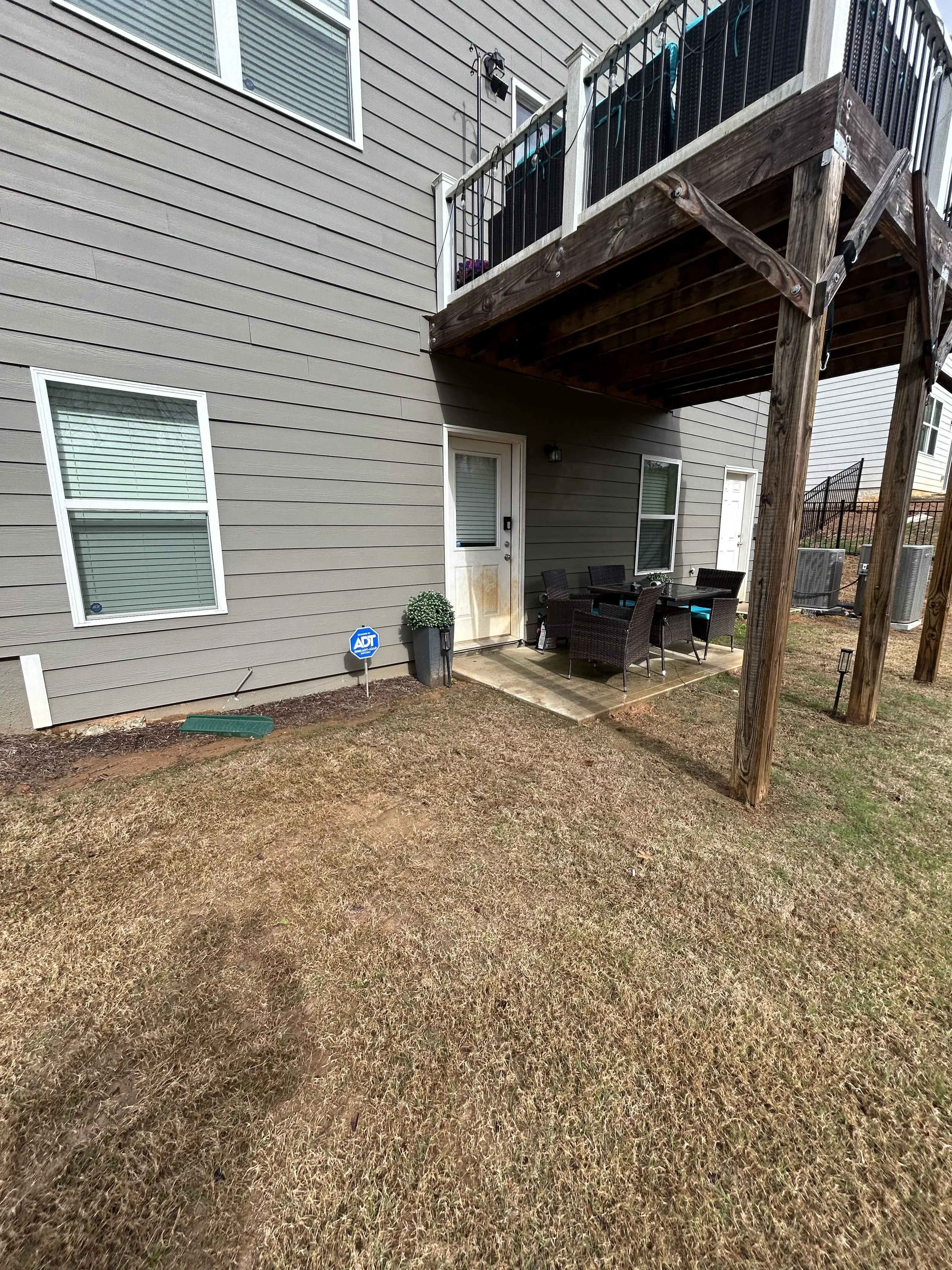 Before and after junk removal in Douglasville GA showing full property cleanout transformation