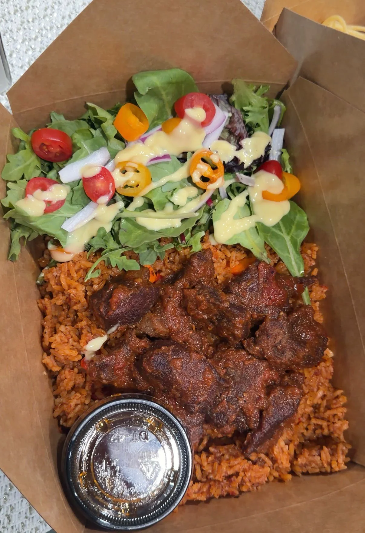 Jollof with chicken, beef or fish