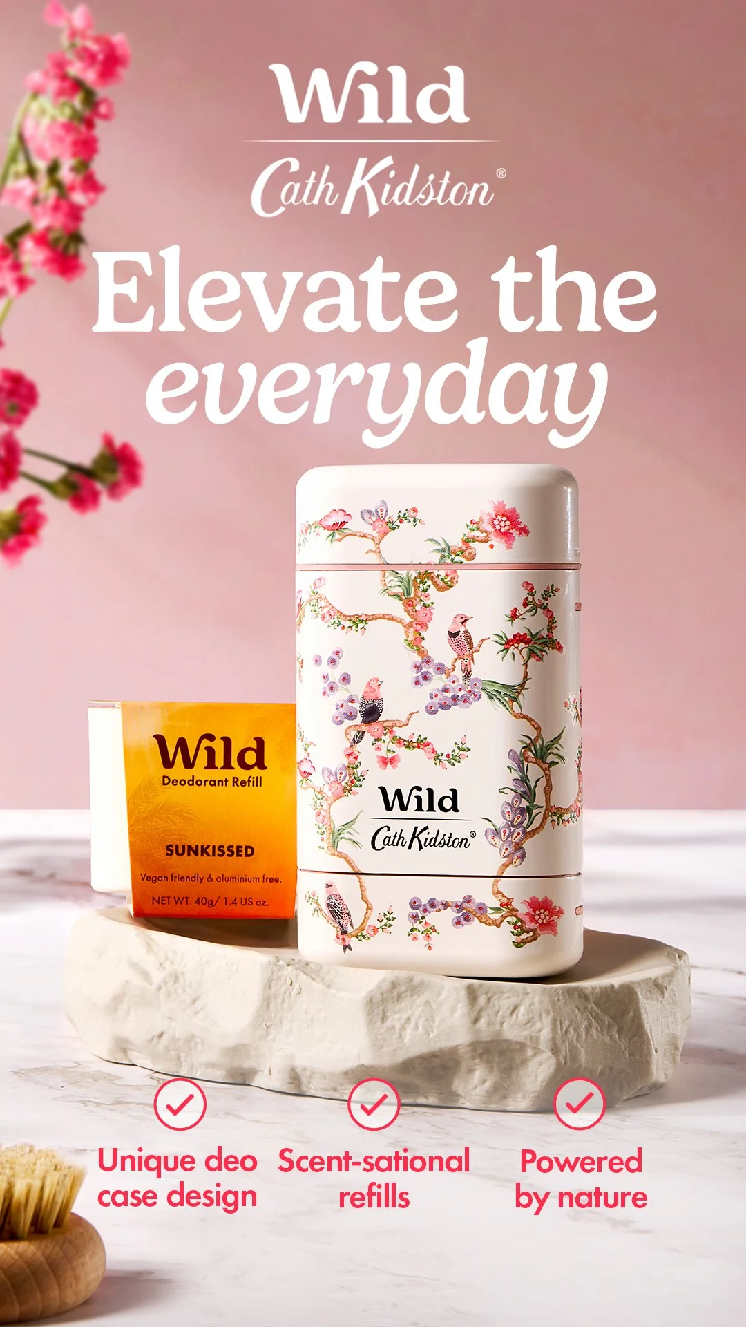 A pink background features a cosmetic product display with a decorative tin containing Wild Cath Kidston scent refills, a yellow Wild deodorant refill box, and highlighting features for unique case design, scent-sational refills, and being powered by nature.
