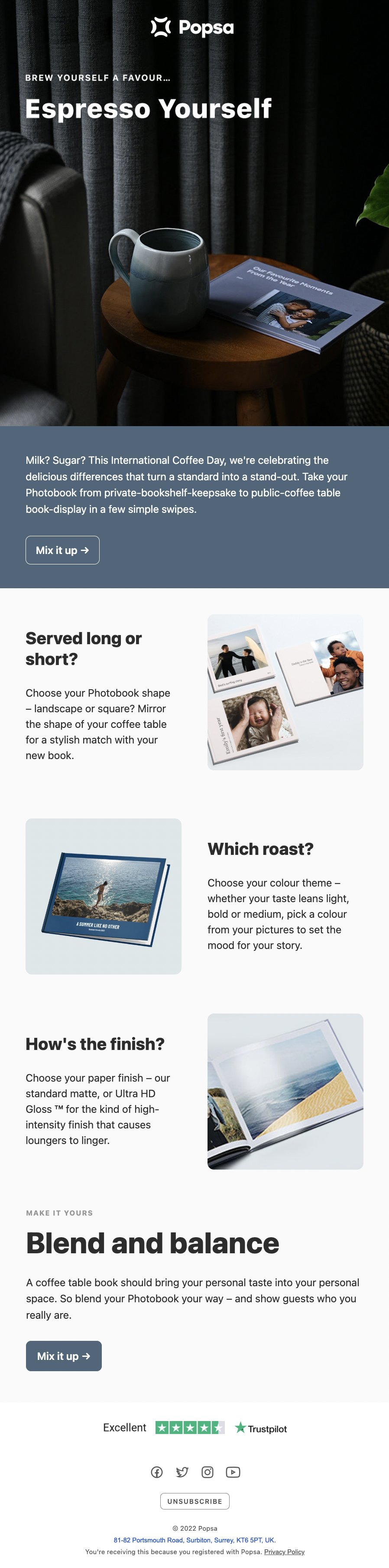 A promotional email for Popsa's custom photo books, featuring a coffee mug on a wooden table, alongside a magazine, with a dark backdrop.