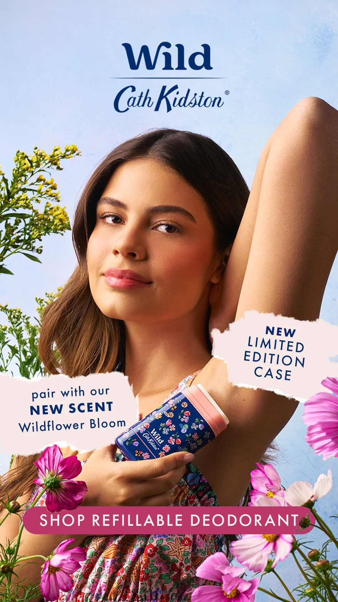 A young woman holds a bottle of Wildflower Bloom scented deodorant. She has her arm raised, showcasing her underarm. The background features a blue sky and pink flowers, highlighting a fresh and natural theme. The advertisement promotes a limited edition case and a new scent.