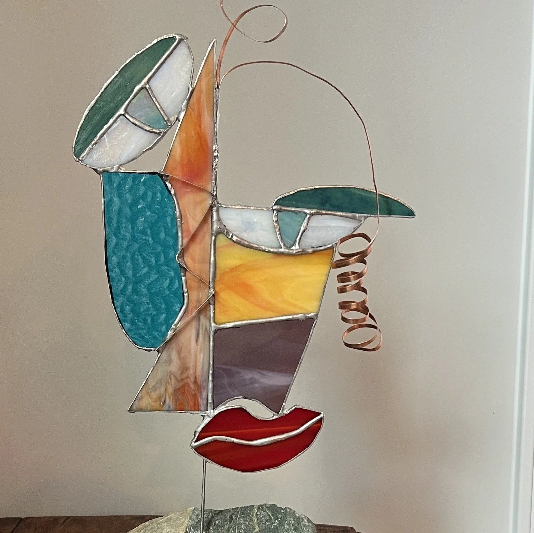 Abstract Face in Rock Base