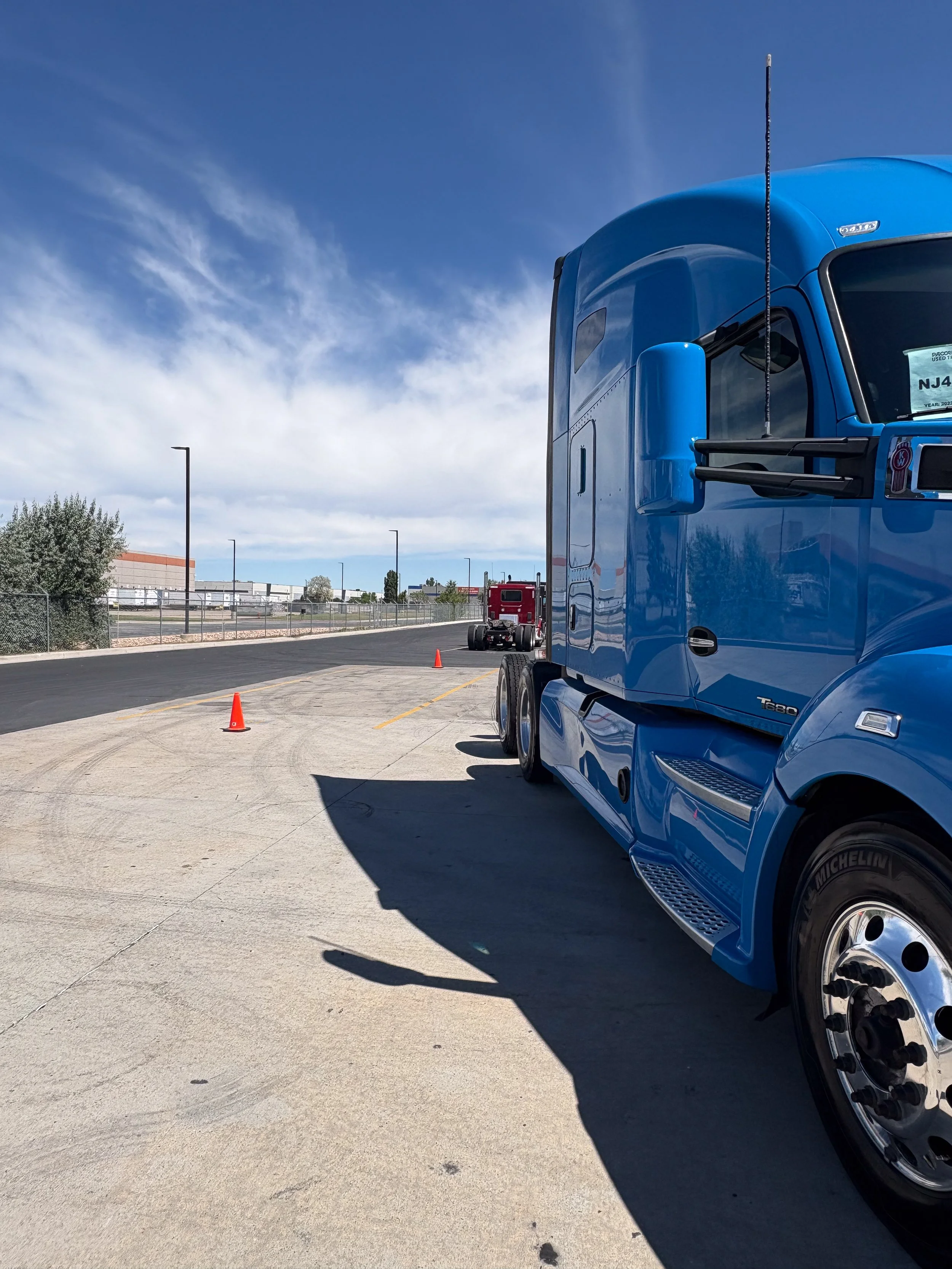 62-blue-kenworth-t680-front-3q-after.jpg