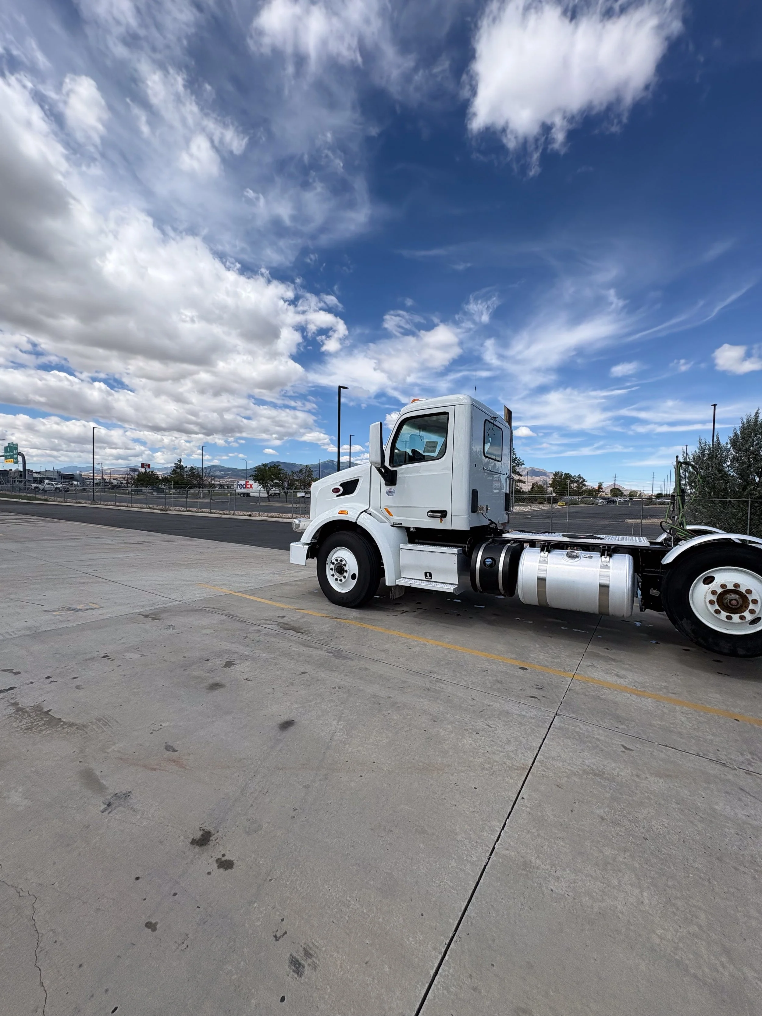 86-white-peterbilt-day-cab-front-3q-after.jpg
