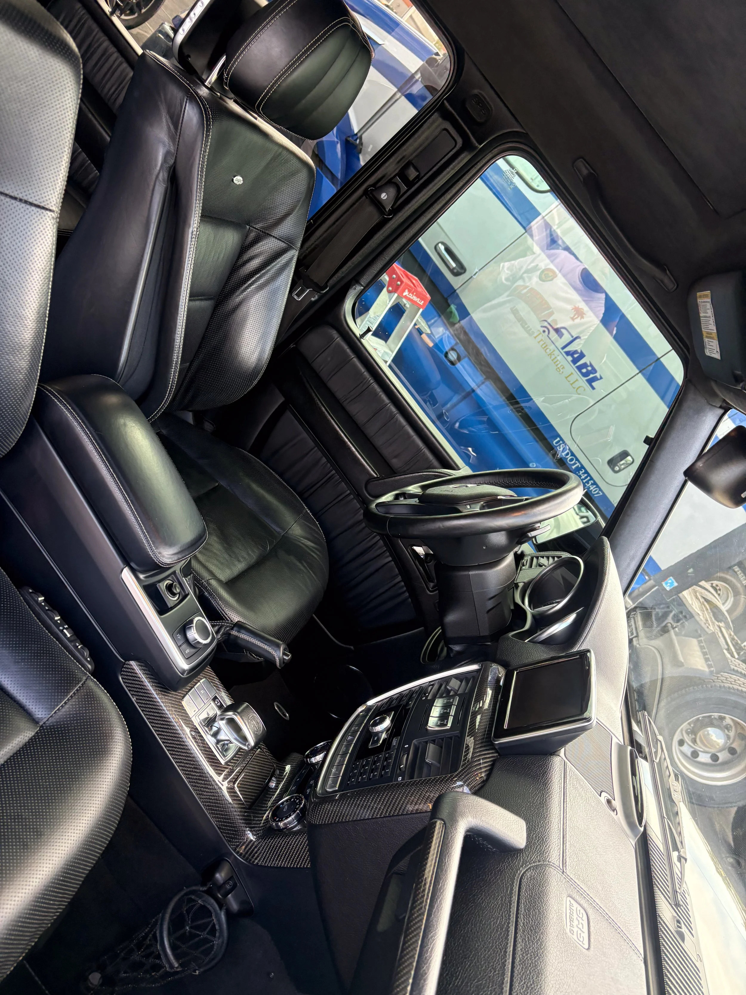 43-mercedes-g63-suv-interior-driver-overhead.jpg