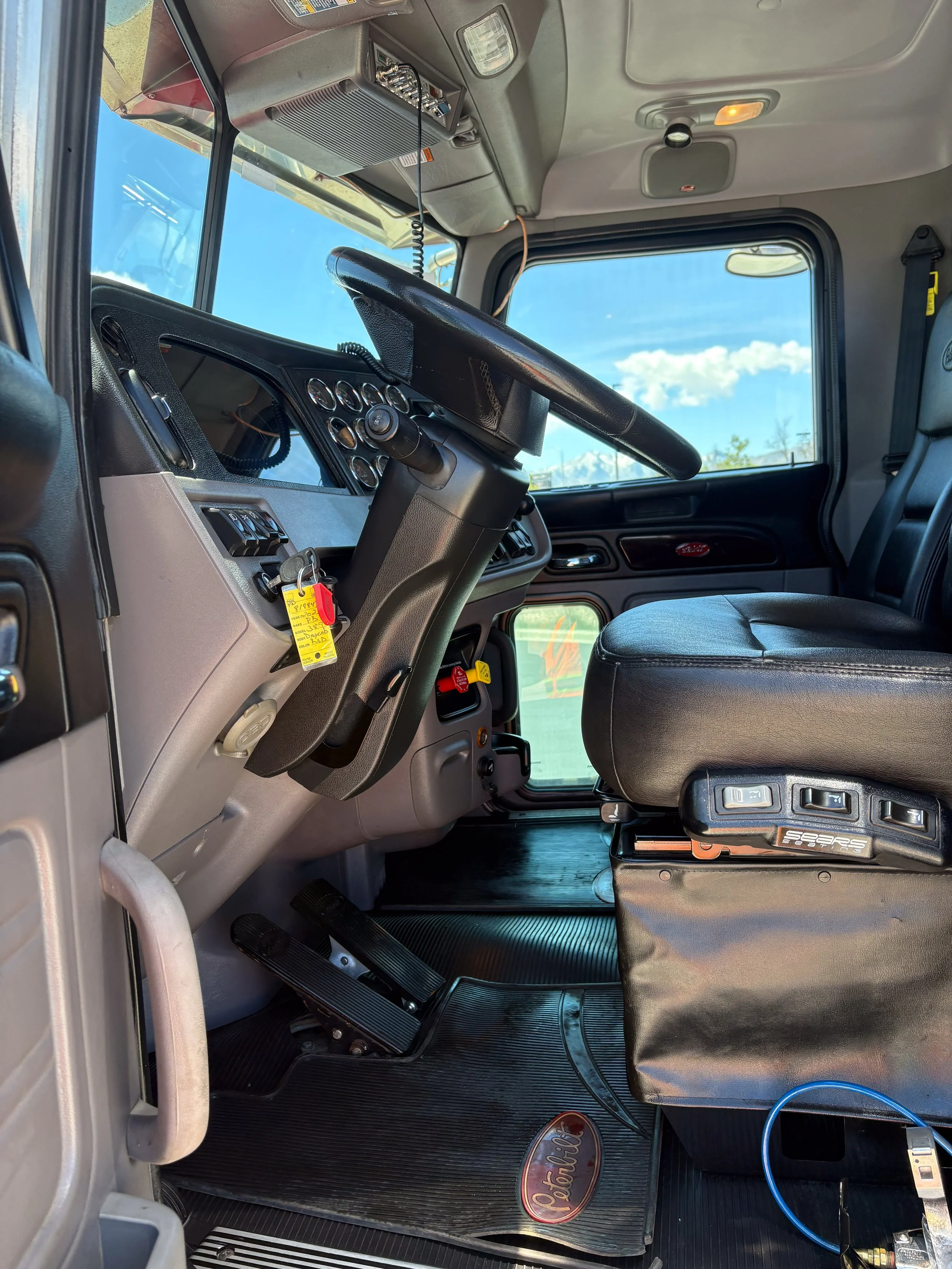 31-maroon-peterbilt-389-interior-driver-side-after.jpg