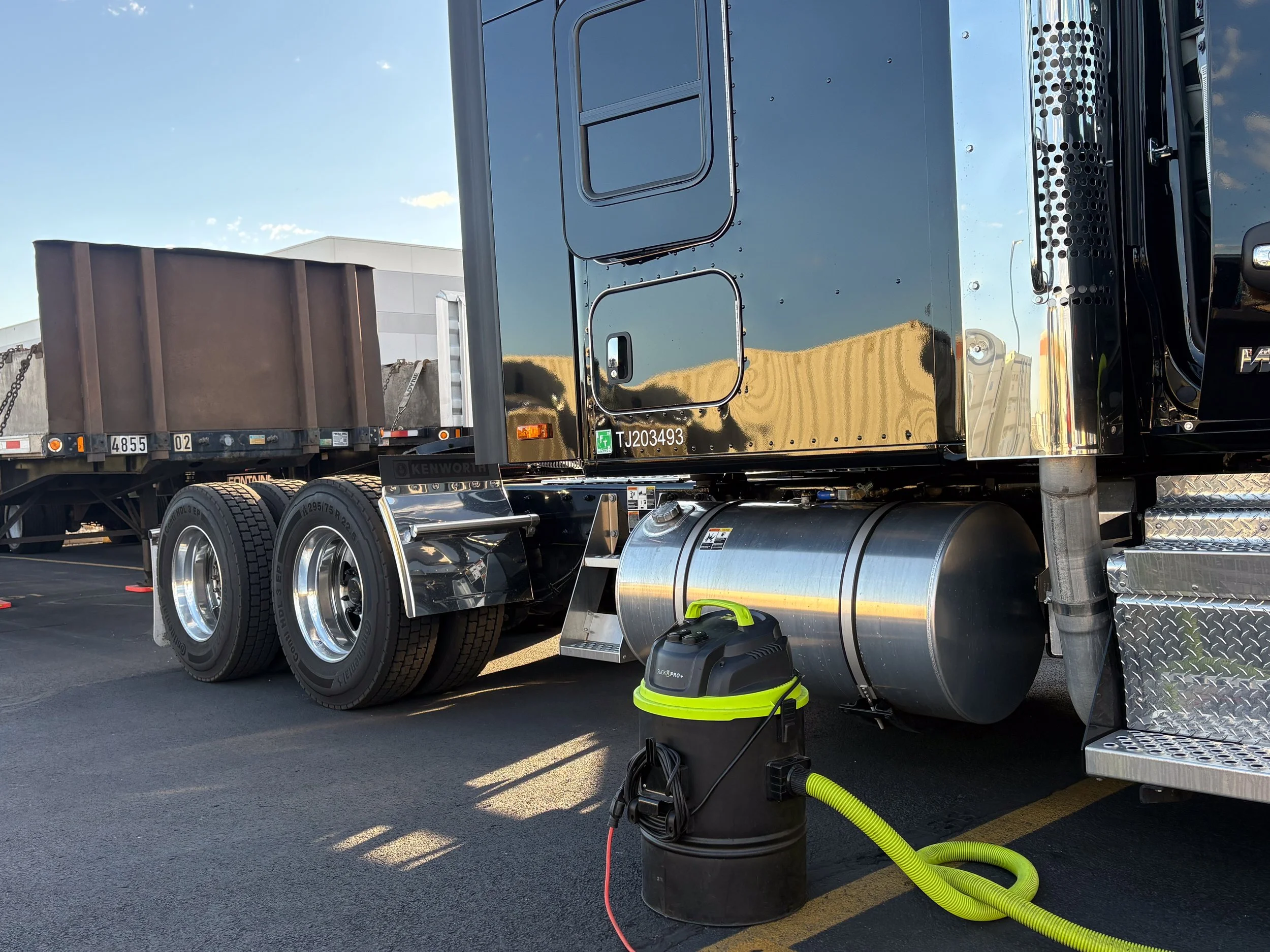 56-black-kenworth-w990-behind-sleeper-detail.jpg