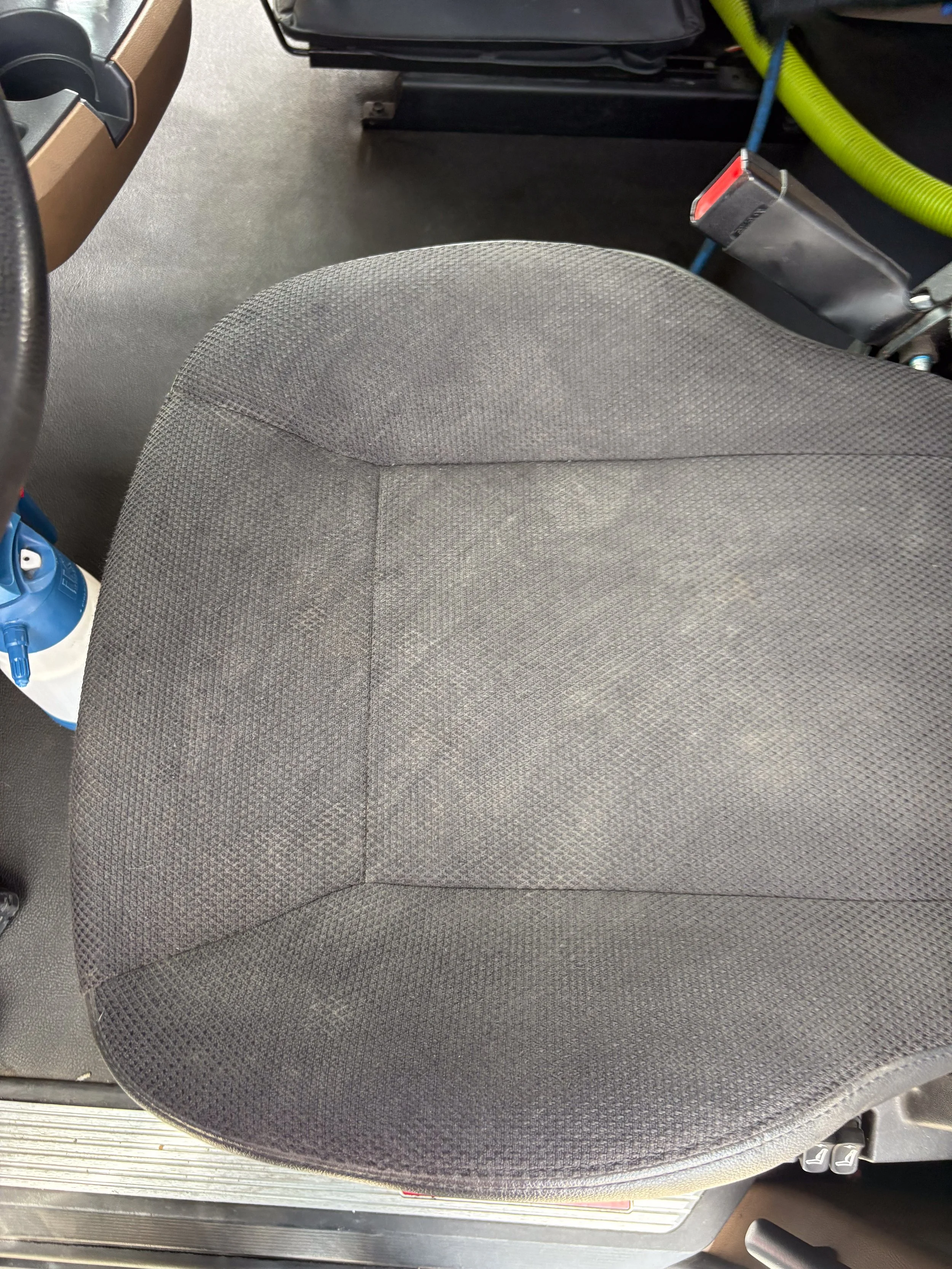 11-green-kenworth-t680-interior-driver-seat-cleaning.jpg