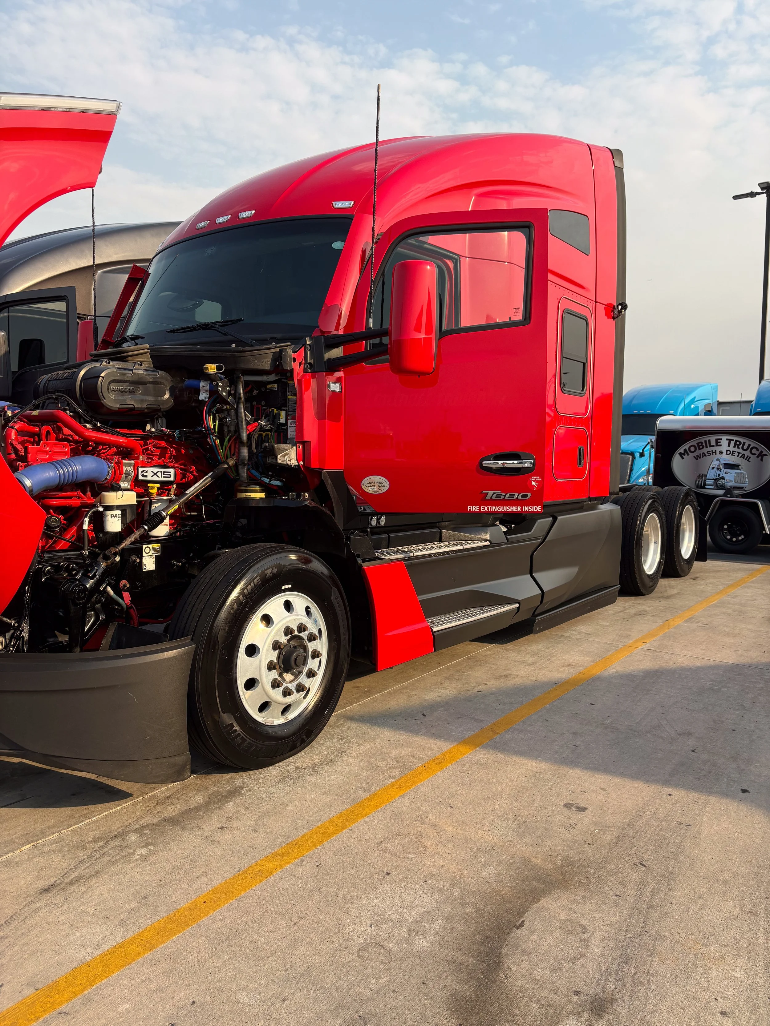 82-red-kenworth-t680-engine-bay-detail-dusk.jpg