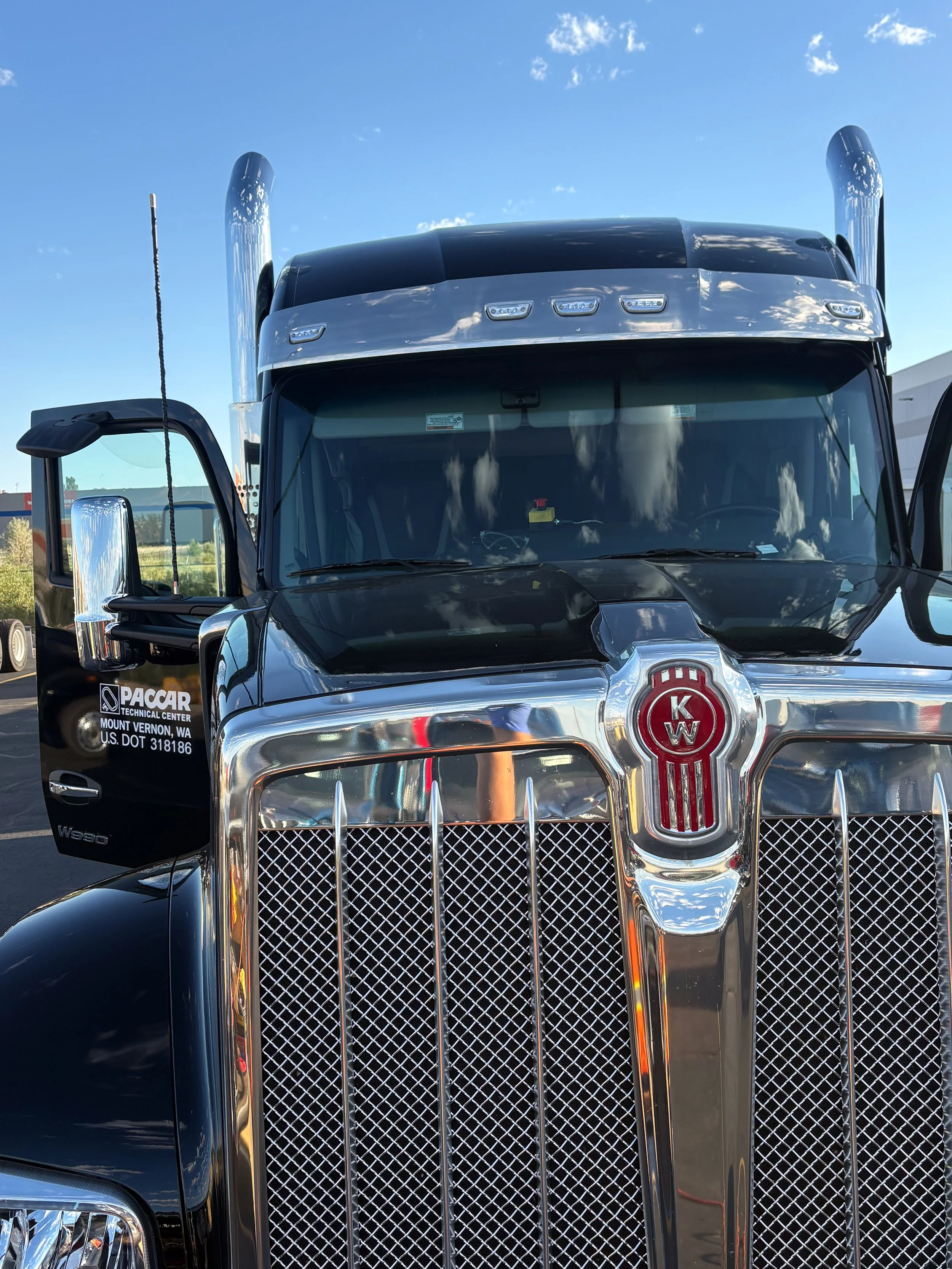 54-black-kenworth-w990-front-3q.jpg