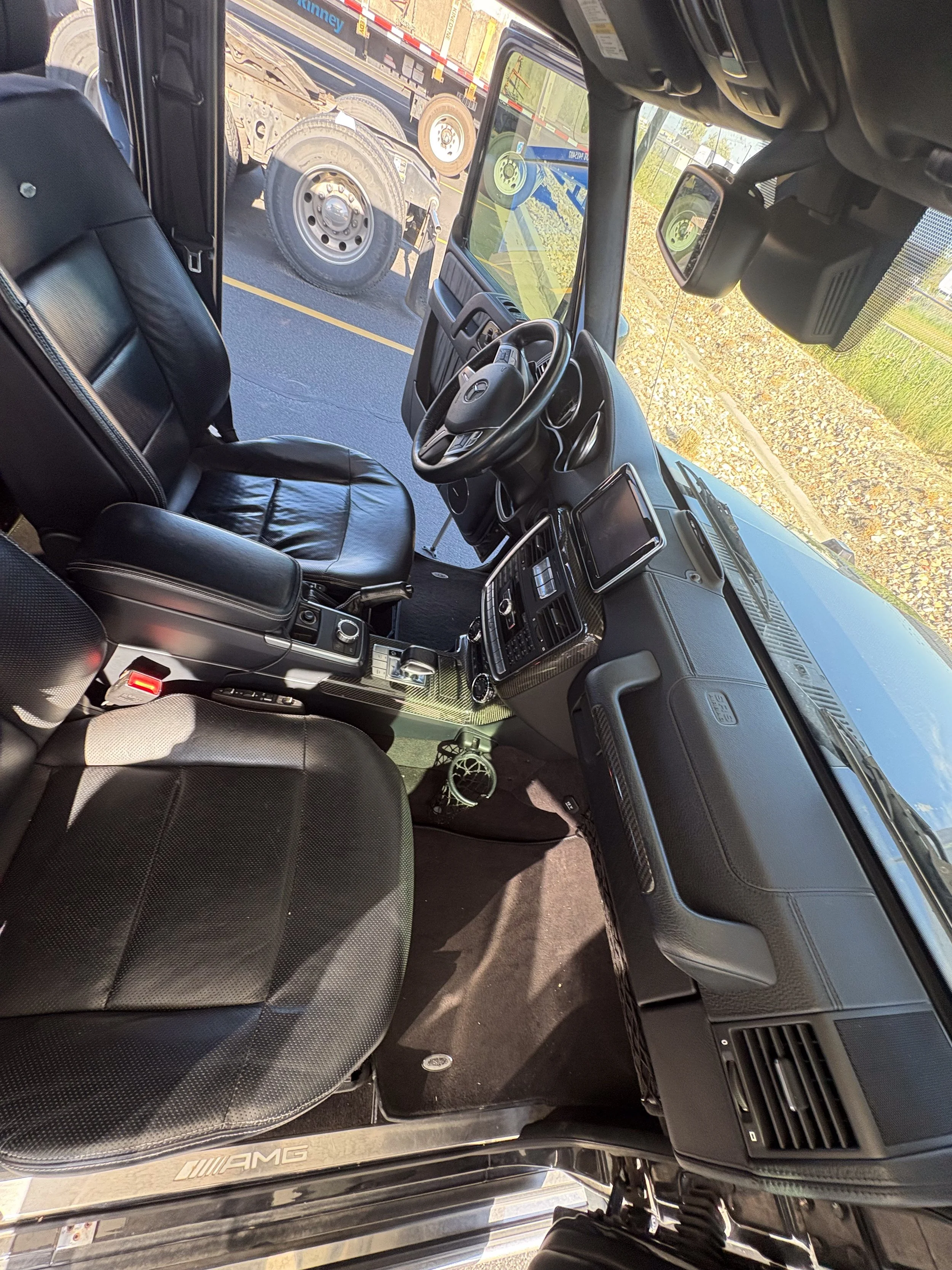 39-mercedes-g63-suv-interior-front-driver.jpg