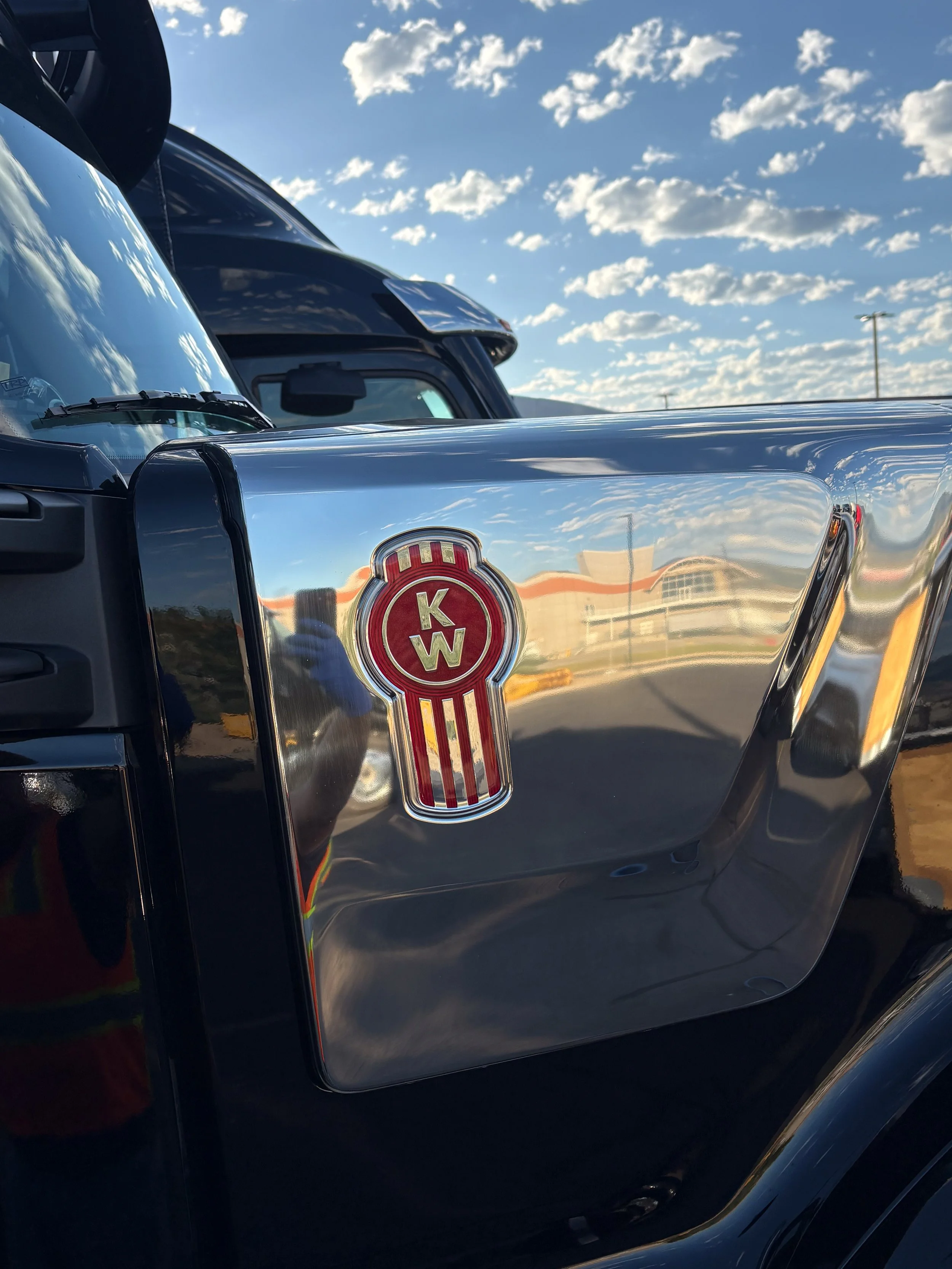 55-black-kenworth-w990-hood-emblem-closeup.jpg