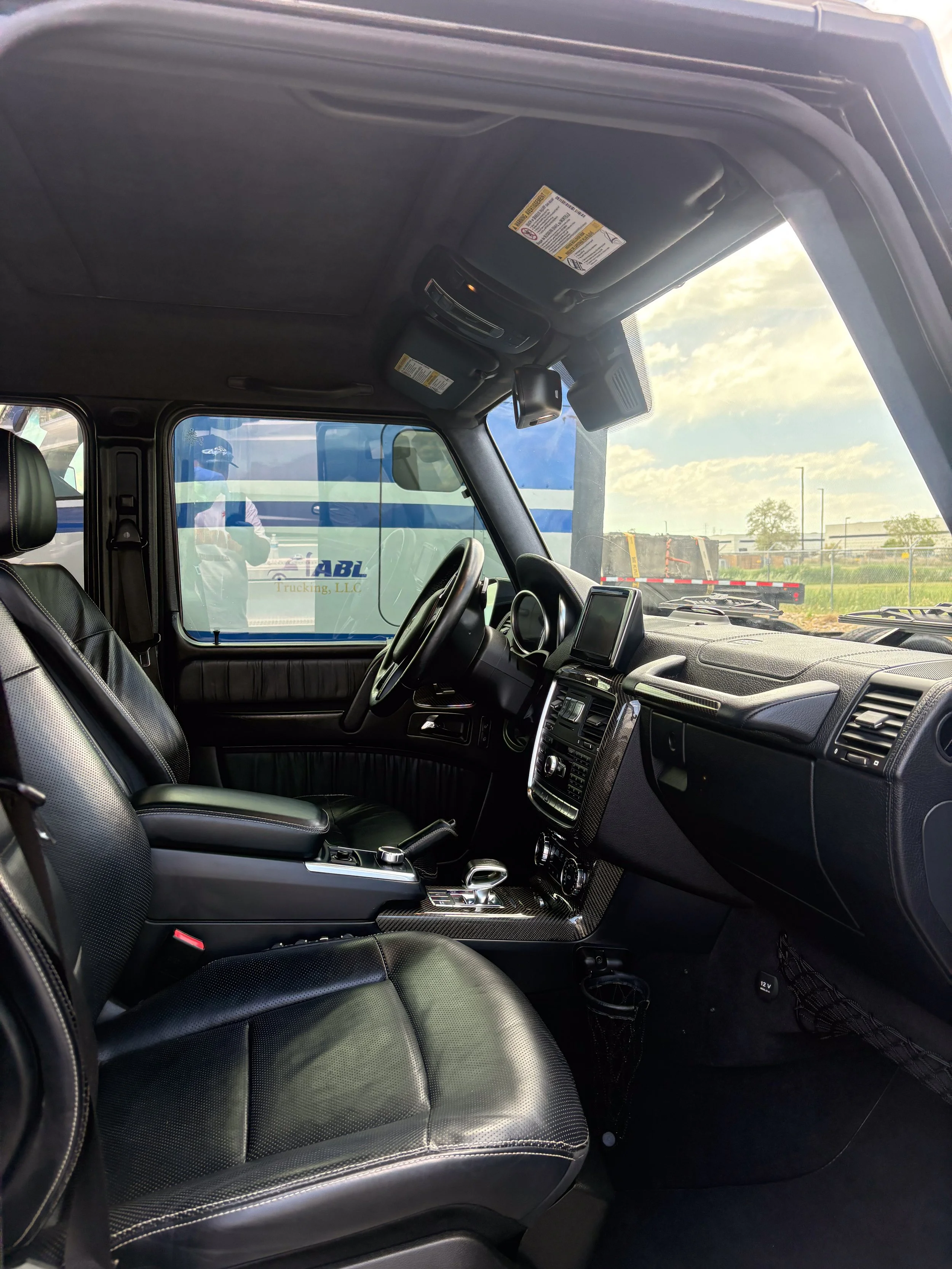 42-mercedes-g63-suv-interior-front-passenger.jpg