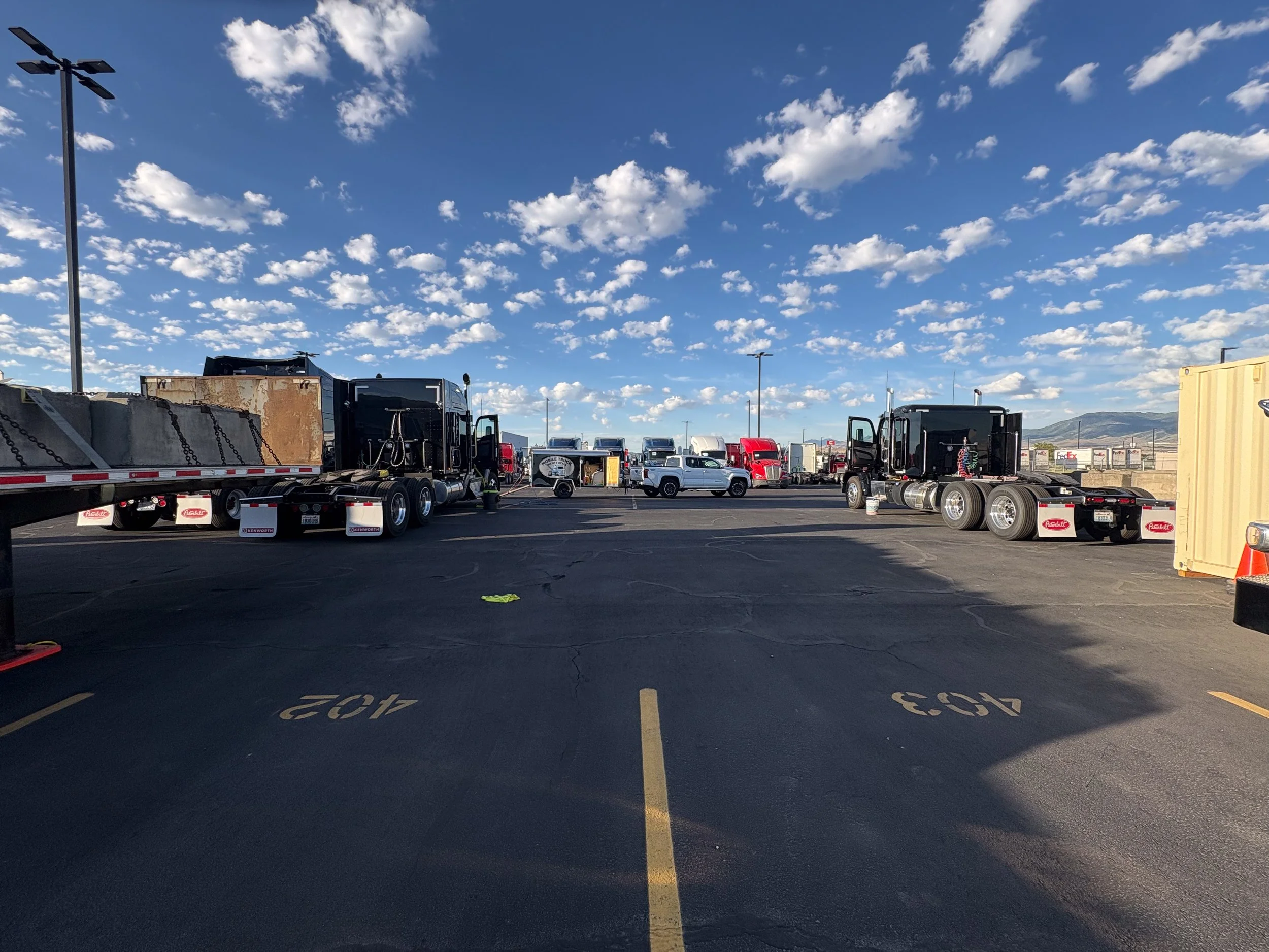 59-job-site-overview-black-trucks.jpg
