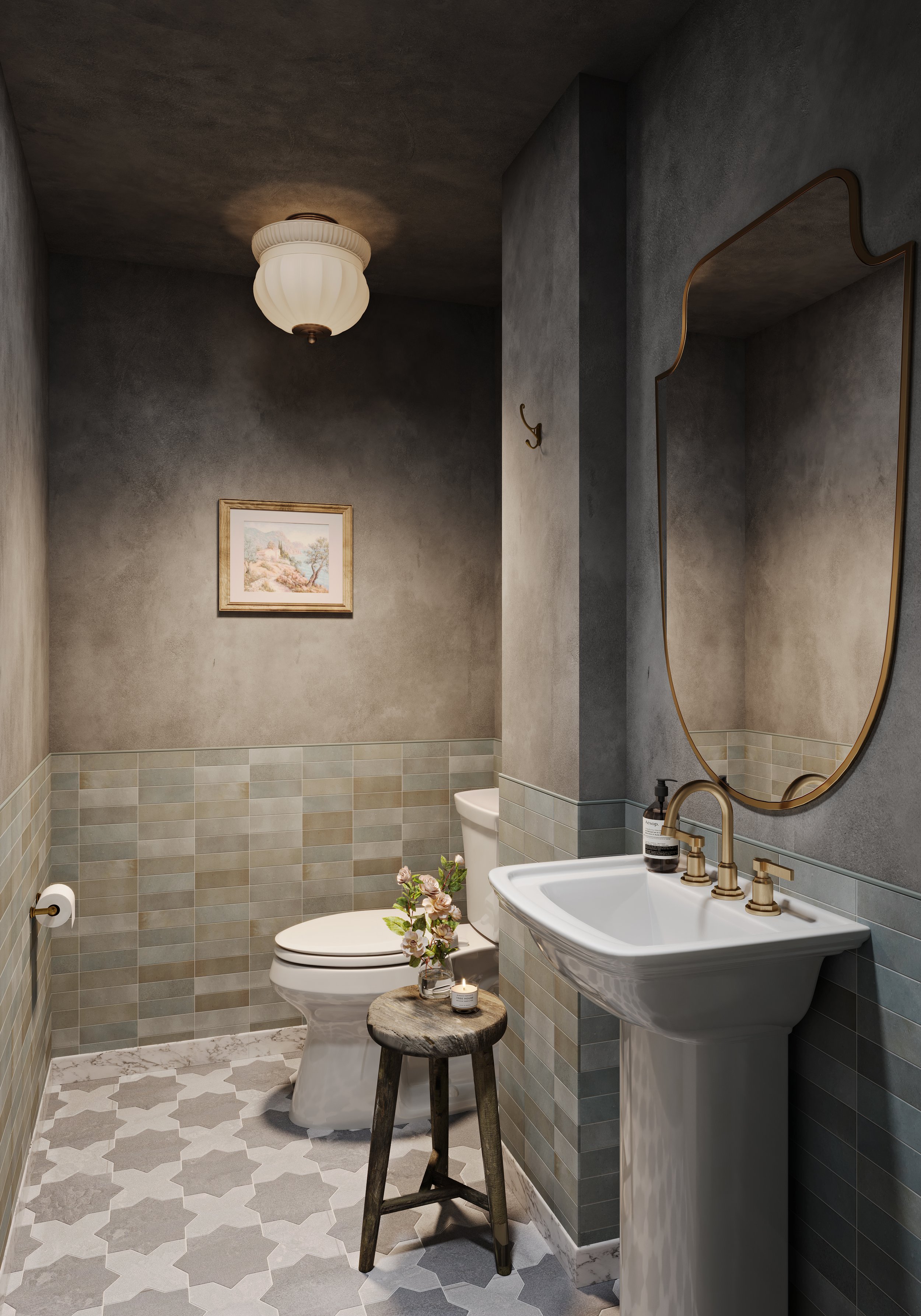 Modern bathroom with gray textured walls, a white toilet, a vintage-style white pedestal sink with gold fixtures, a round wooden stool with a flower arrangement and candles, a large mirror with a gold frame, a ceiling light fixture, a framed landscap