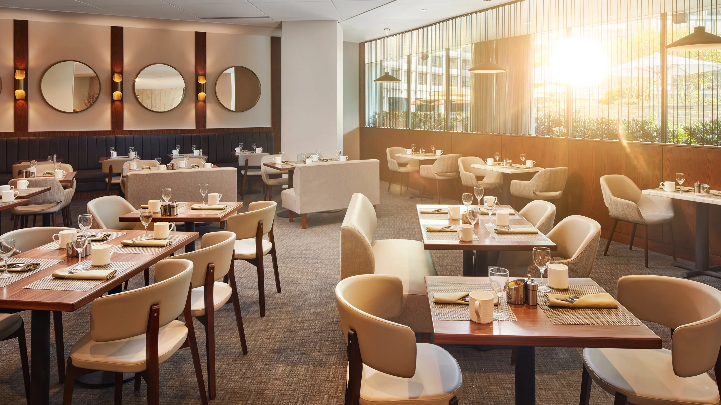 Lobby Dining Four Oaks with sunlight.webp