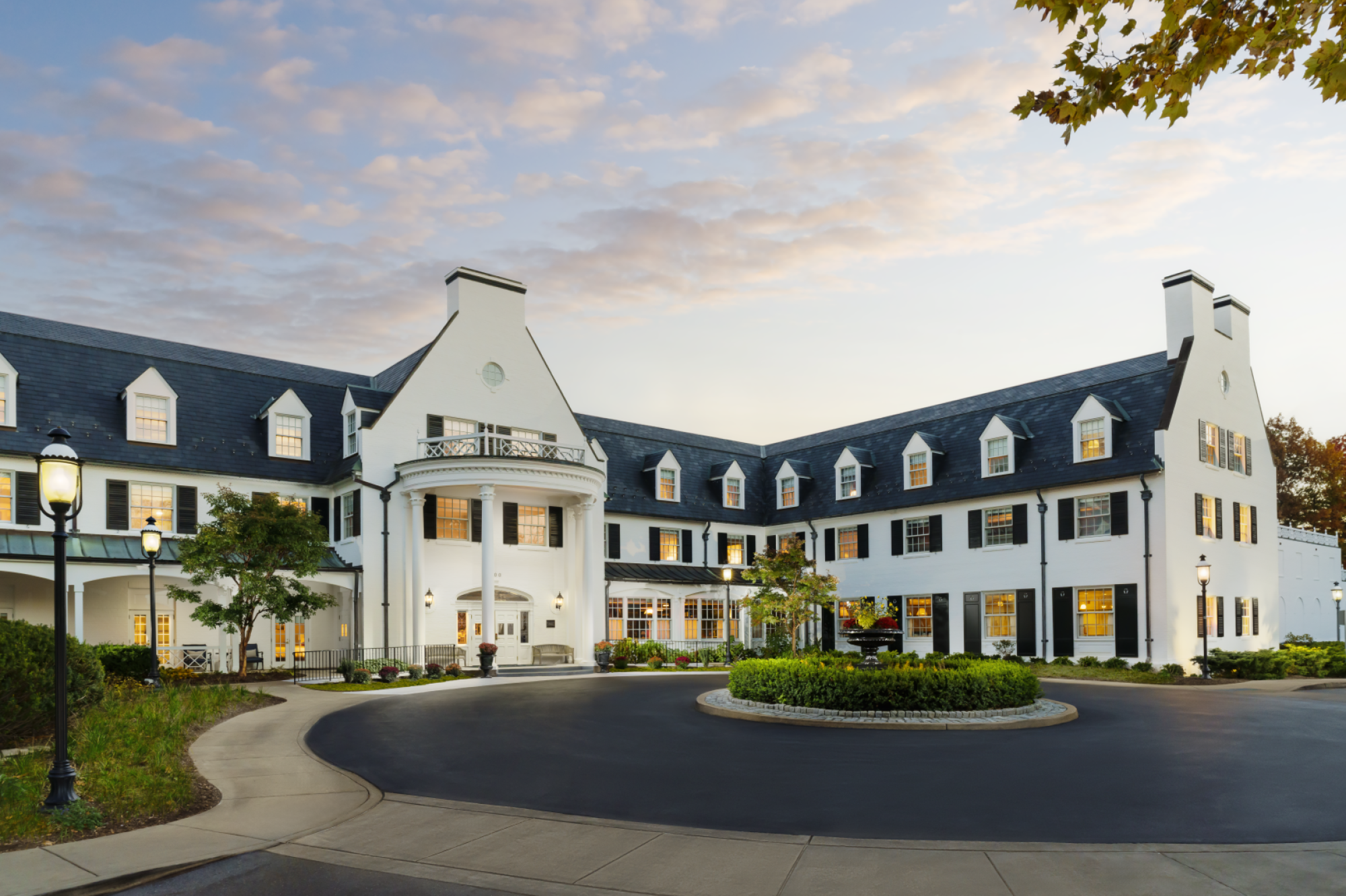 20241020_nittany_lion_inn_dusk_exterior.2000x0.png