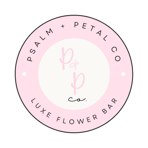 Logo for Psalm + Petal Co., a luxe flower bar, featuring a pink circle with black and pink text and a handwritten 'P + P' in the center.