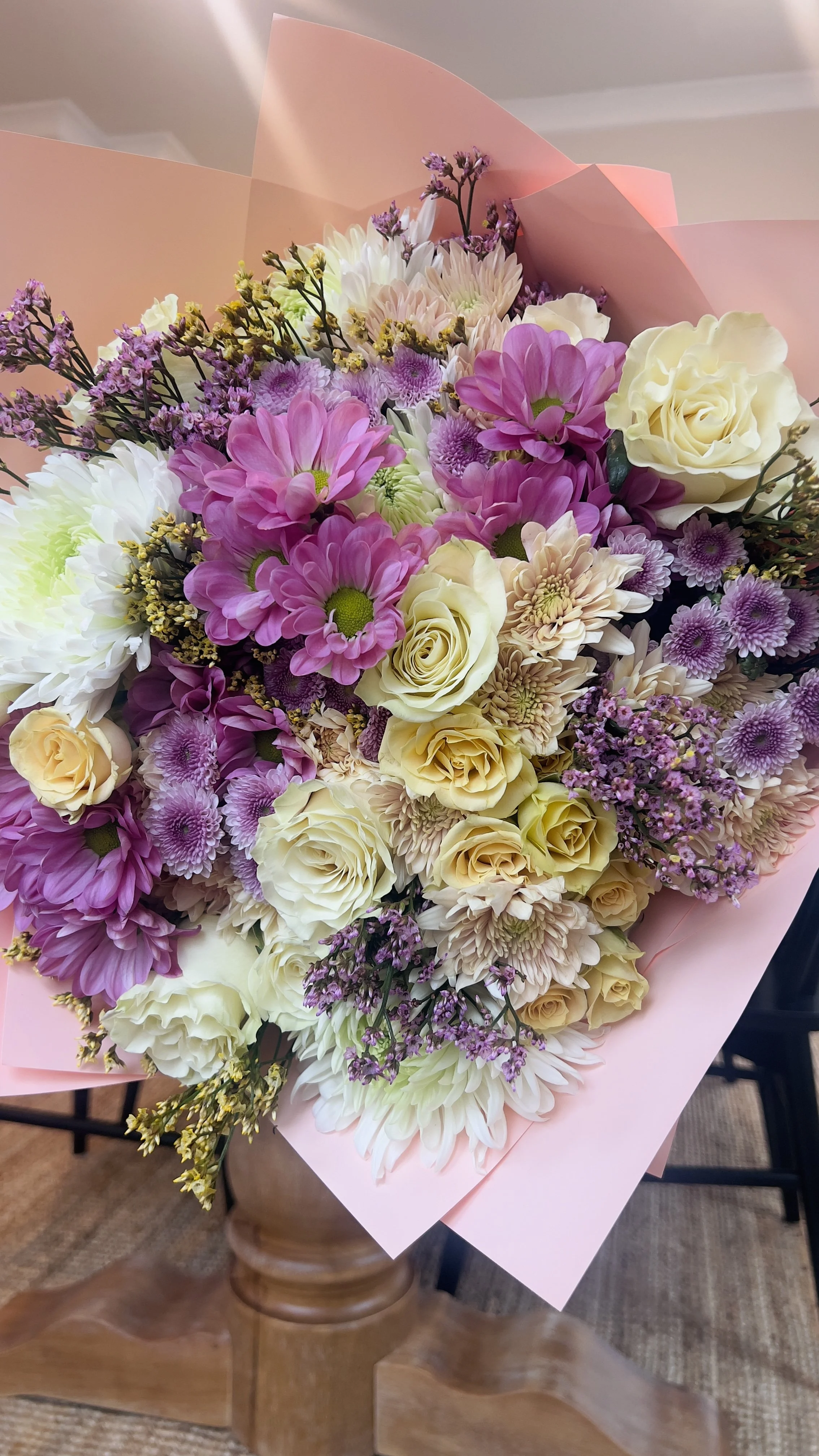 Luxe bouquet with cream roses, yellow spray roses, lavender and cream assorted flowers to accent