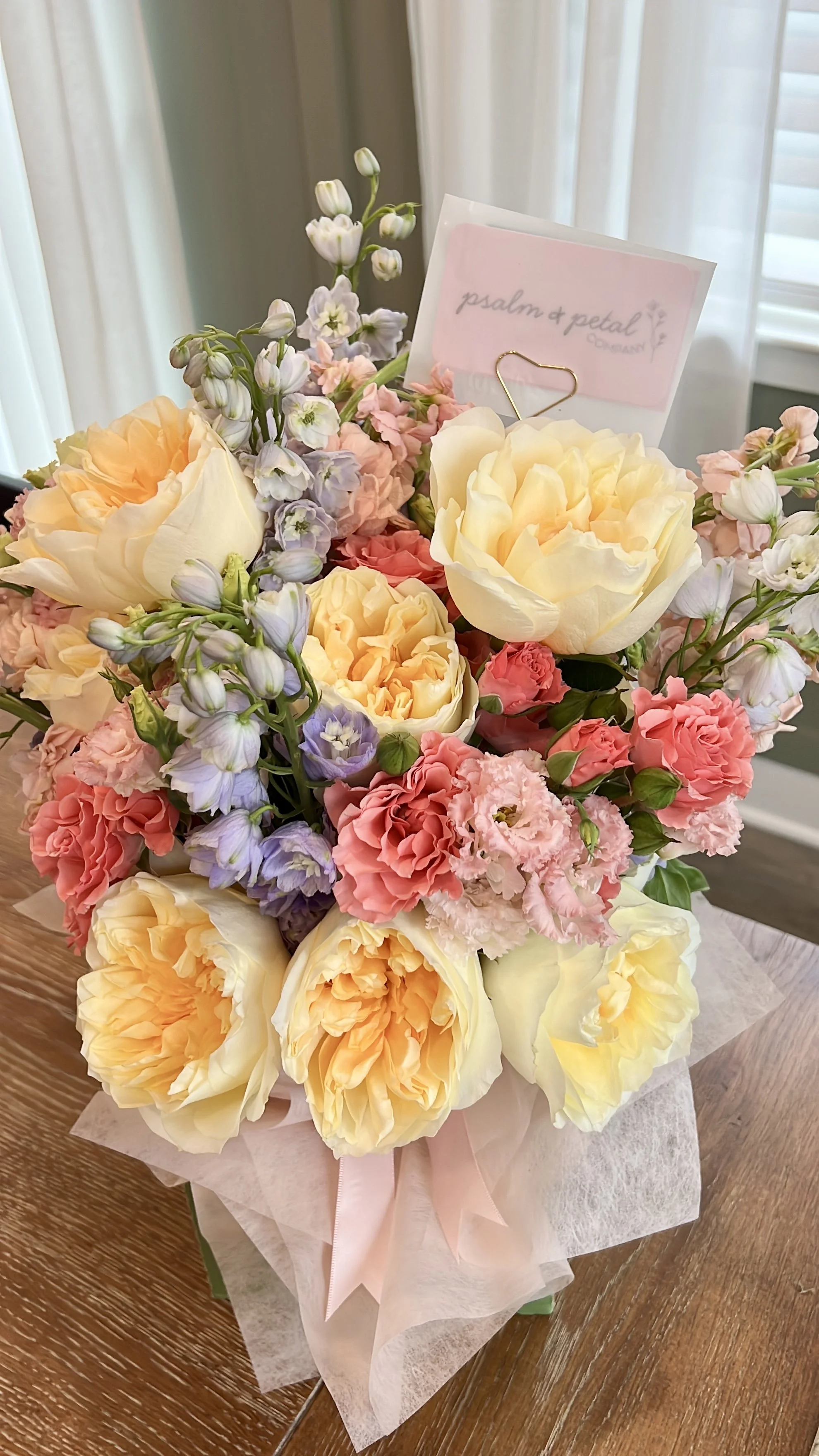 Luxe bouquet with cream roses, yellow spray roses, lavender and cream assorted flowers to accent