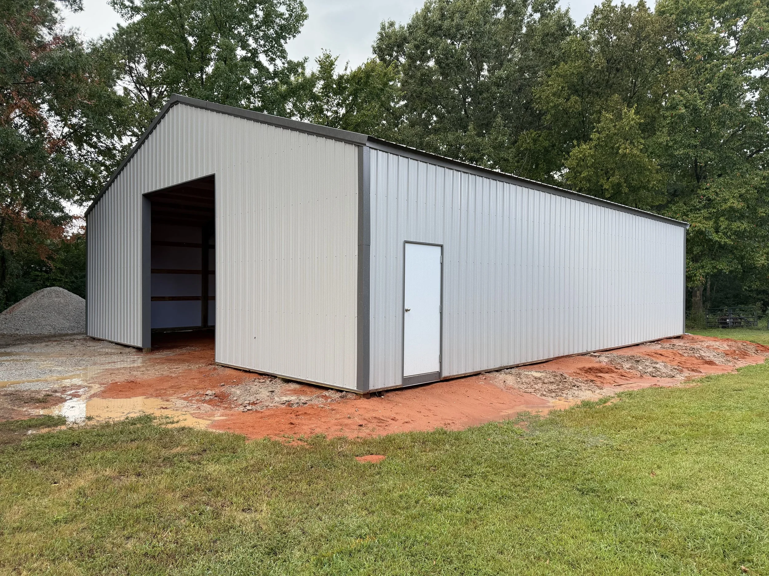 40x60 Polebarn with Garage door.