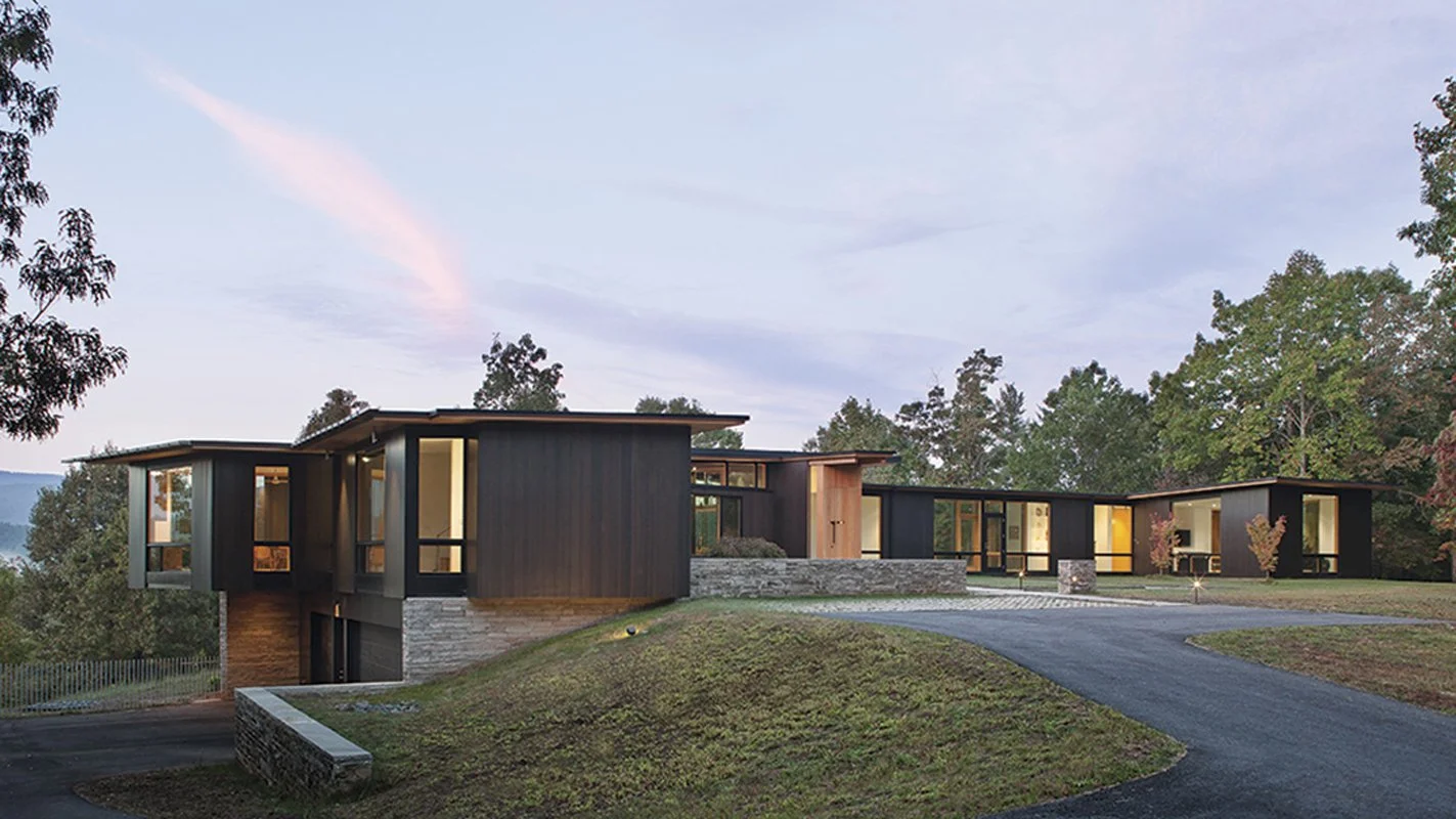 black home with wood details