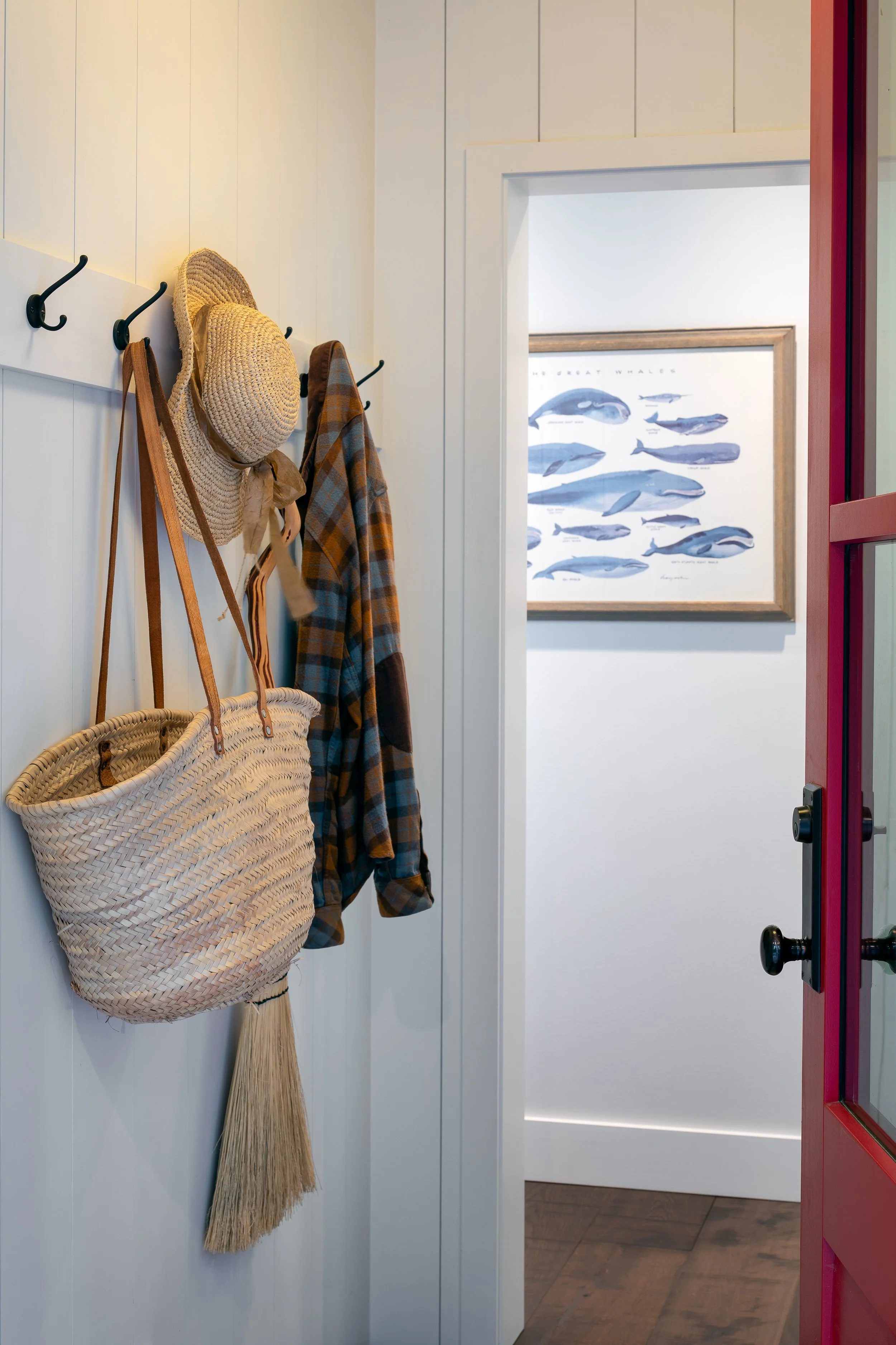 Hooks in a mudroom for organization