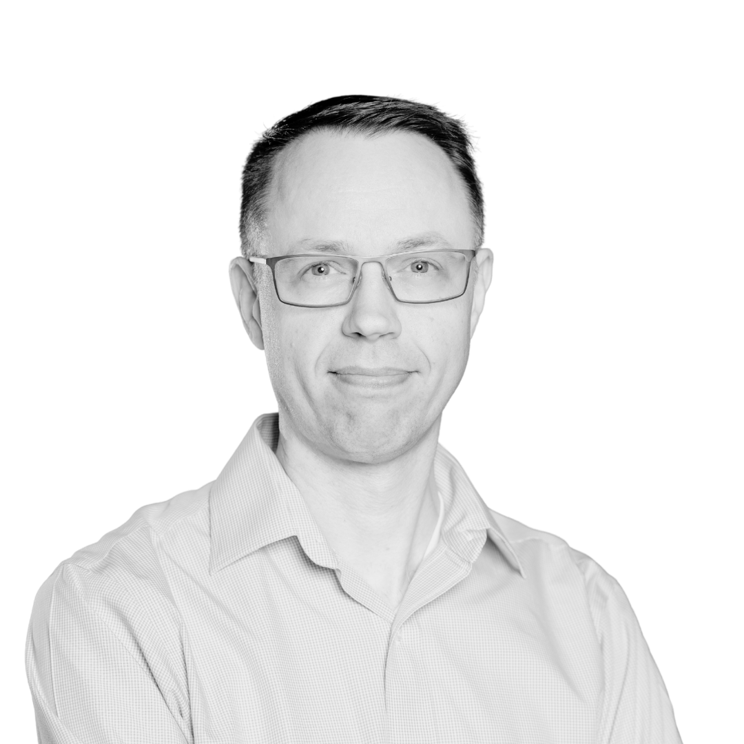 Black and white portrait of Brian Downs brs Partner