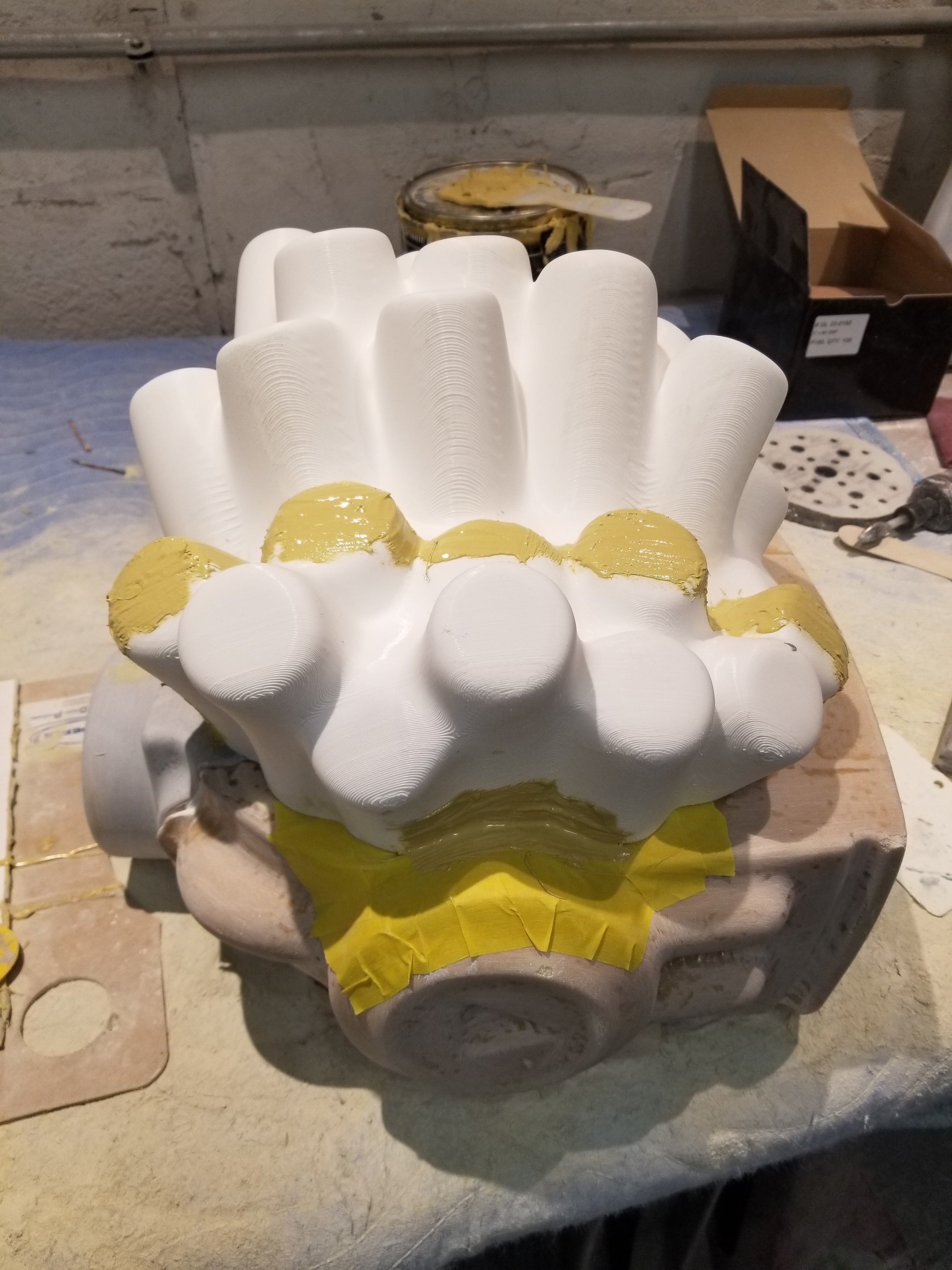 Unfinished LEGO robot head sculpture