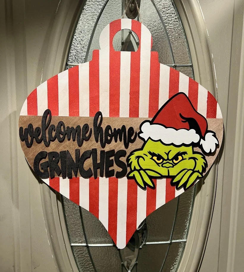 Welcome Home Grinches Door Sign.jpg