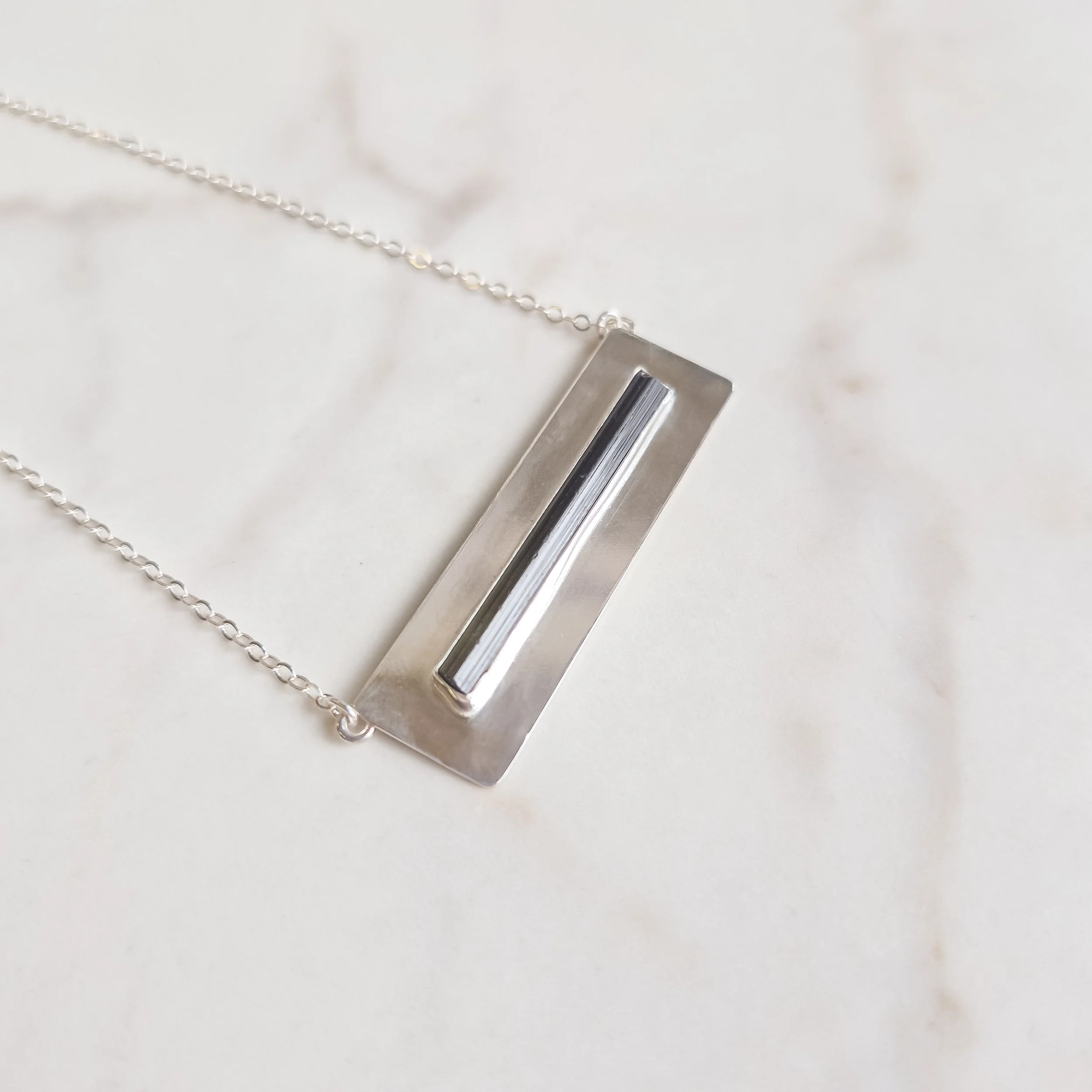 tourmaline-black-bar-necklace-june-2026-1.jpg